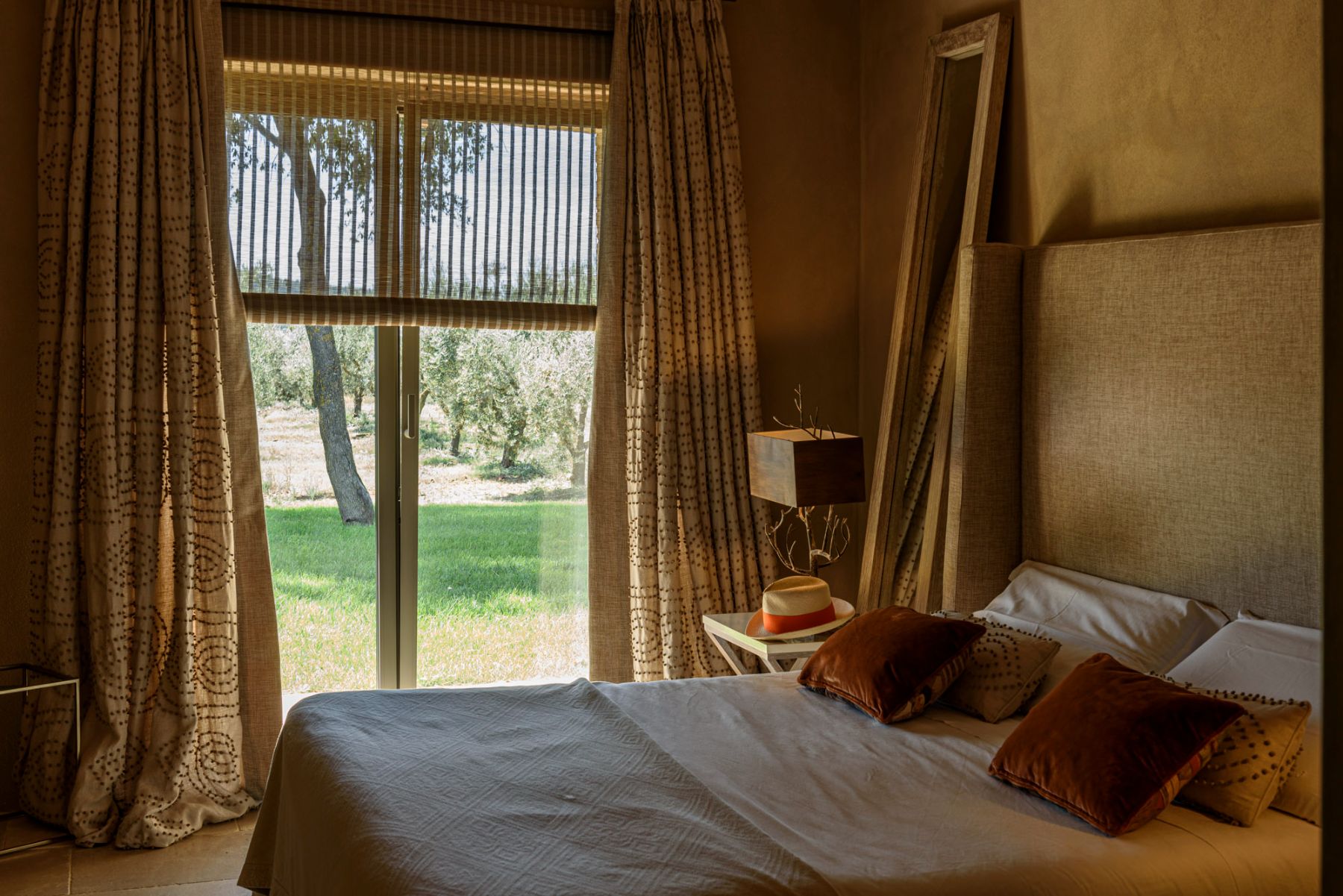 Orange bedroom at Villa Pacetezza in Tuscany