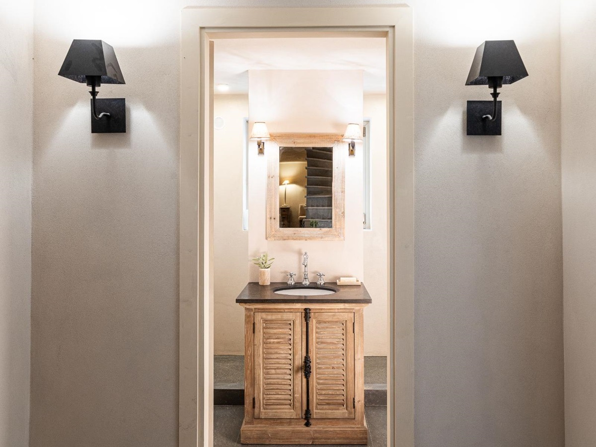 Wooden basin sink in bathroom in Villa Pedemontana in Tuscany