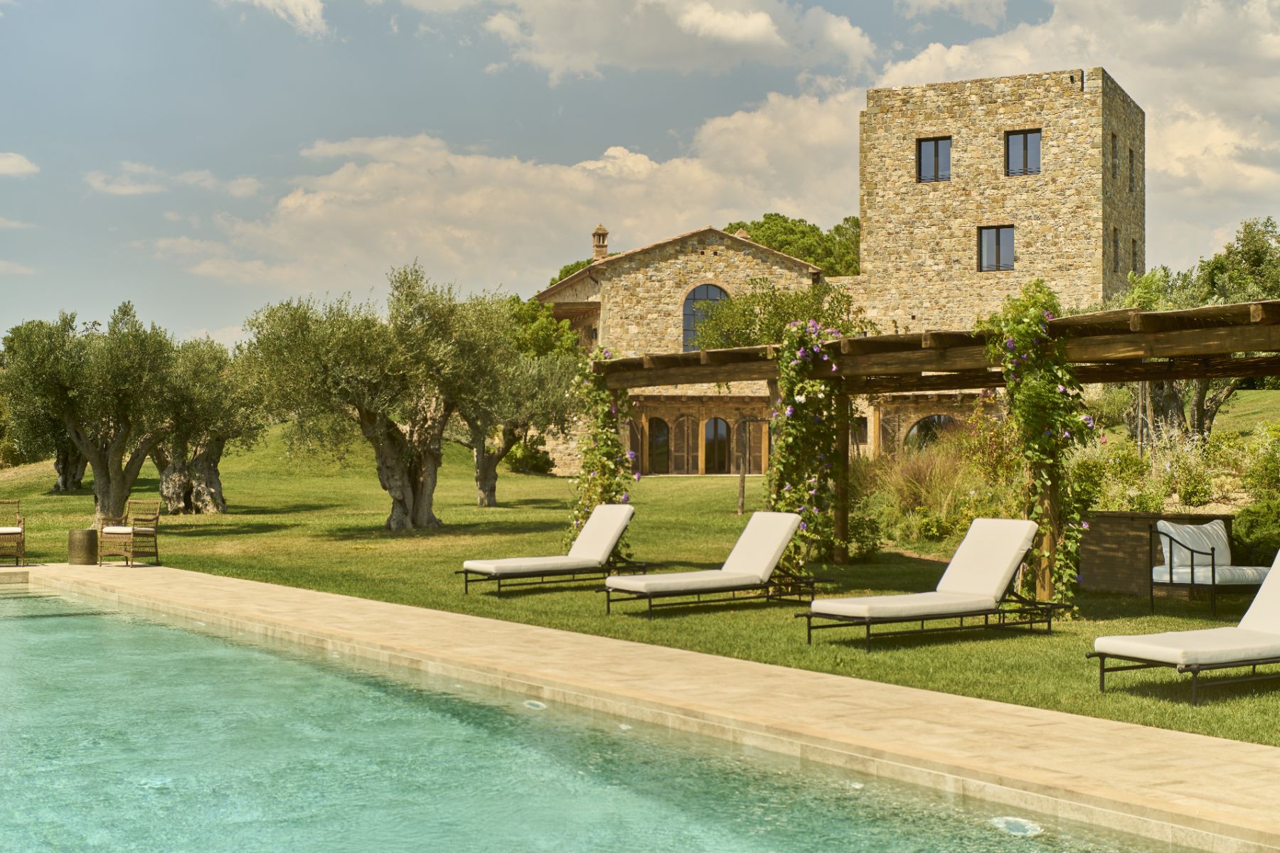 Pool and main villa at Villa Roccamare in Tuscany