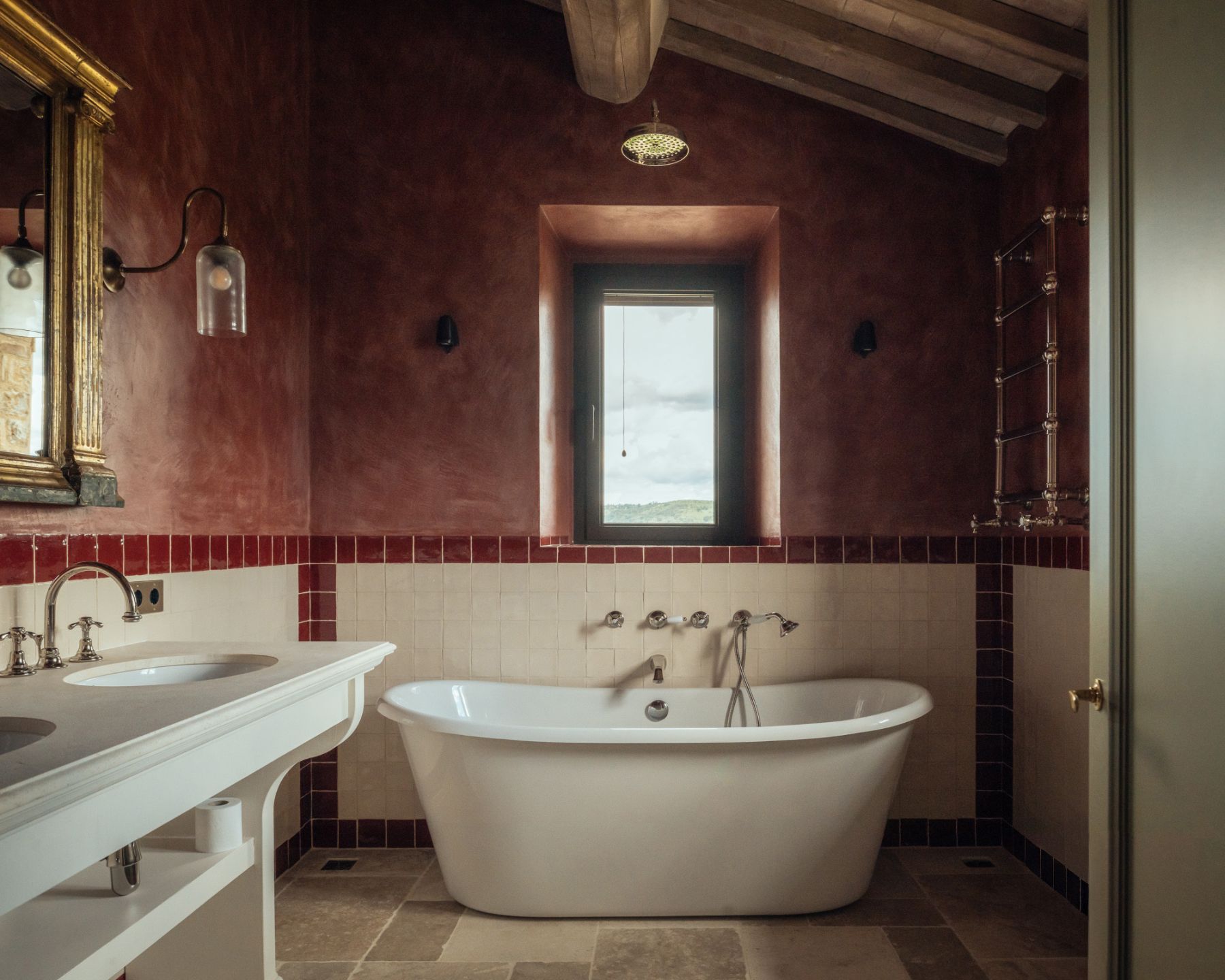 Red bathroom at Villa Roccamare in Tuscany