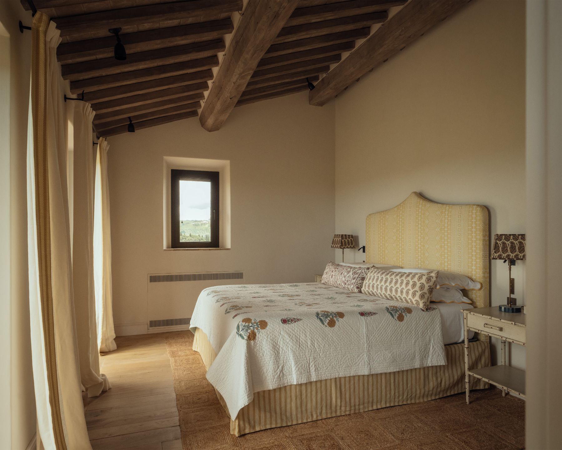 White double bedroom at Villa Roccamare in Tuscany
