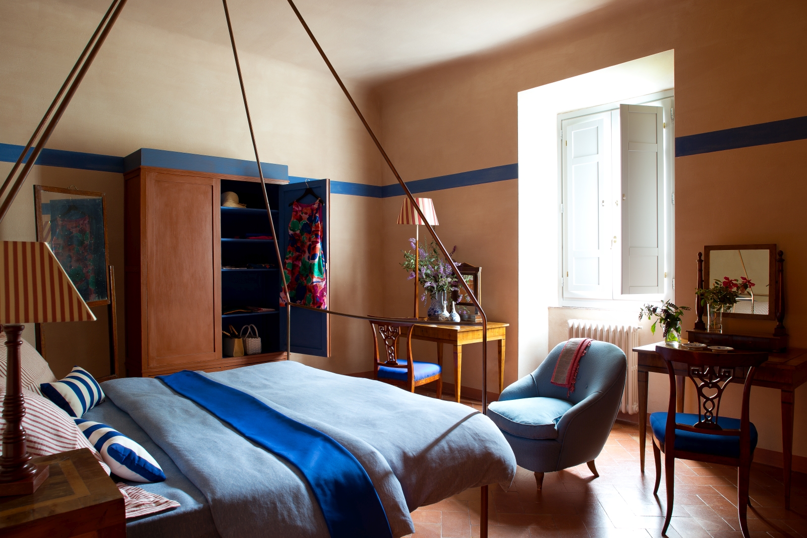 Double bedroom with blue decoration at San Morello in Tuscany