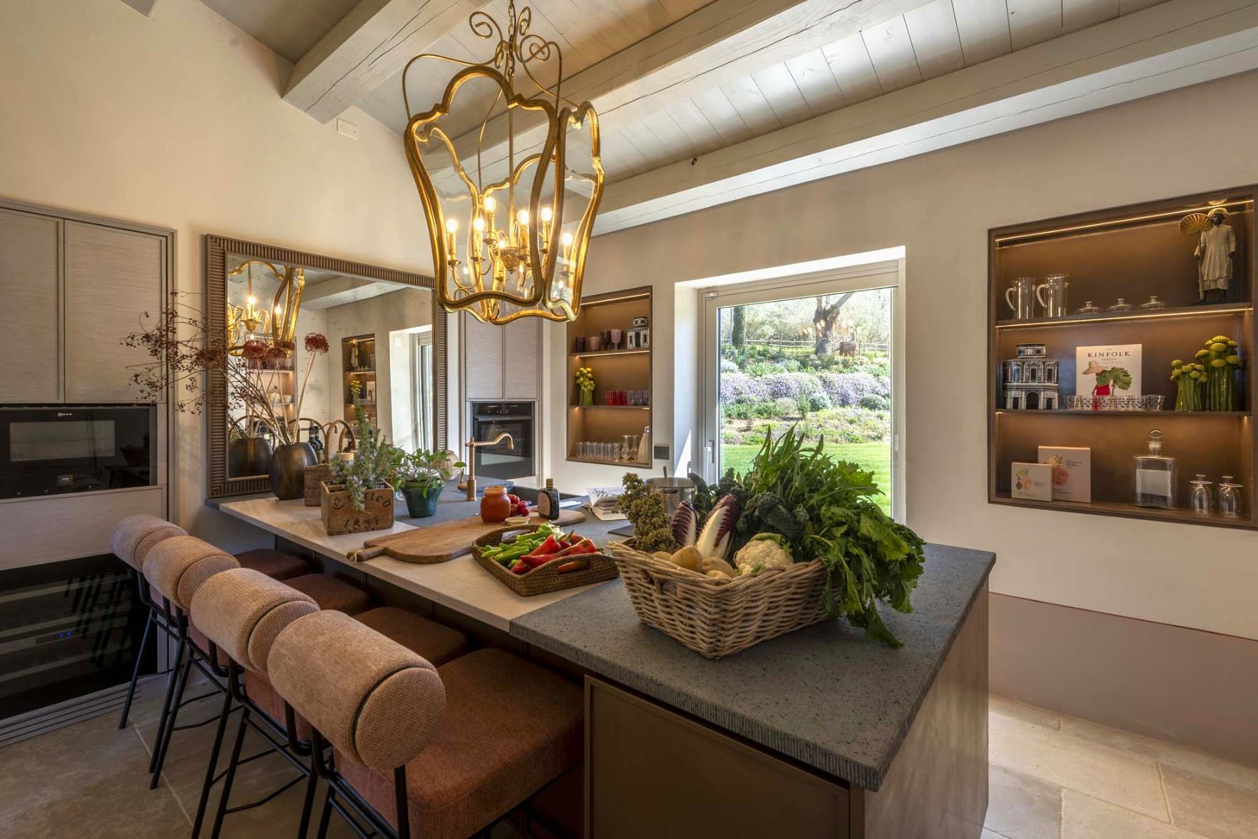 Kitchen counter with fruit and vegetables at Villa Tenerezza in Tuscany