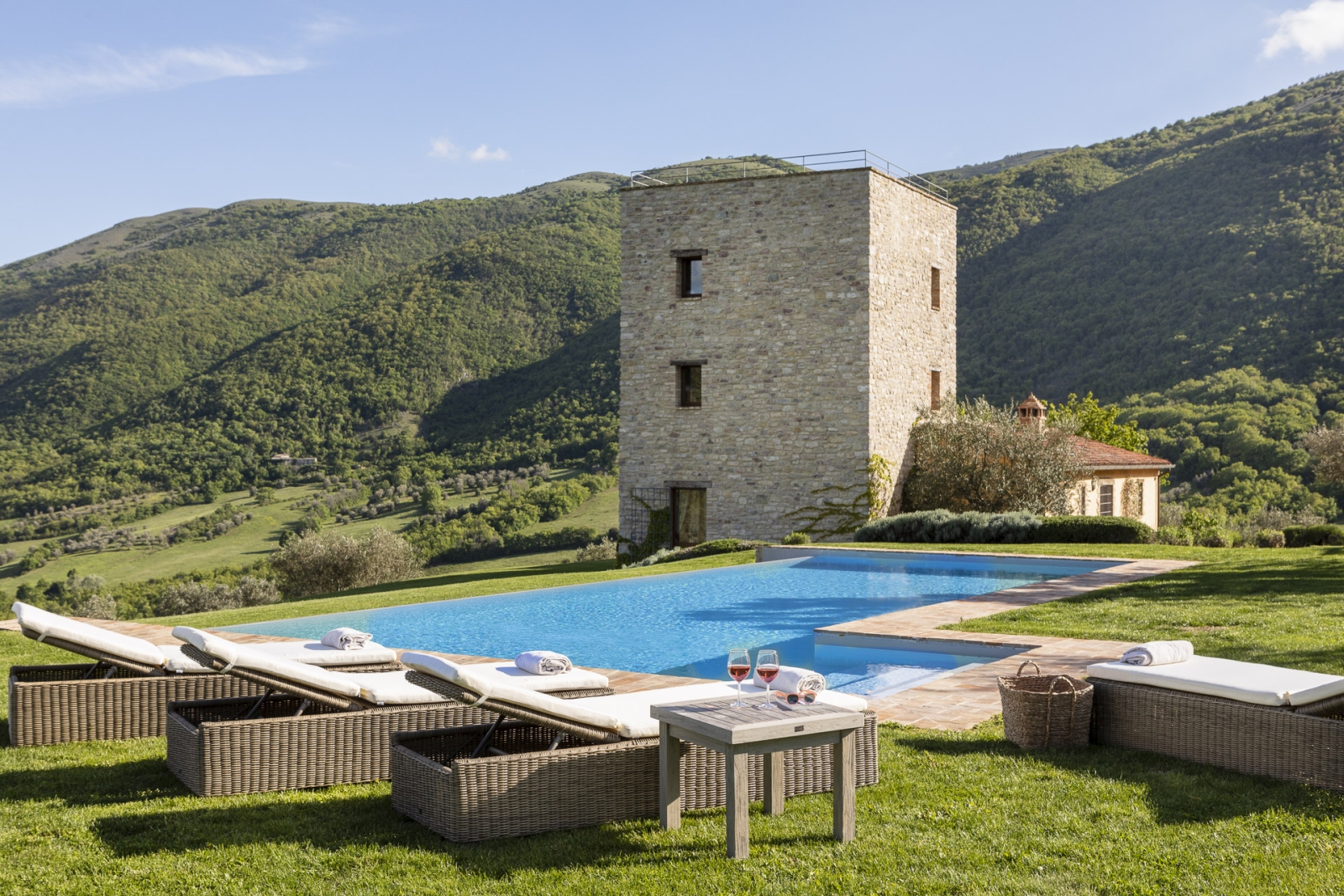 Pool with sun loungers at Bel Canto in Umbria