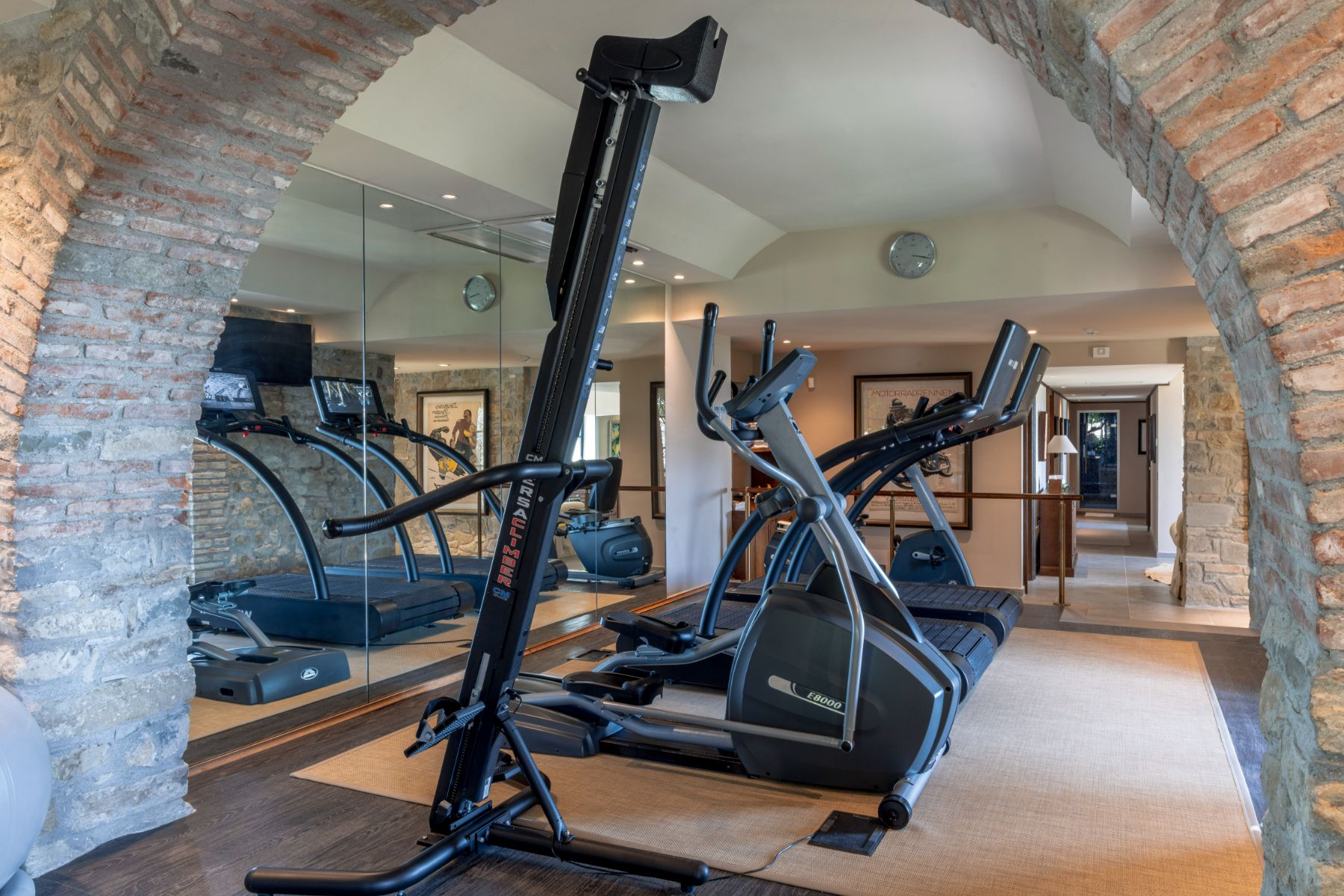 Gym room with different machinery at Villa Il Convento in Umbria