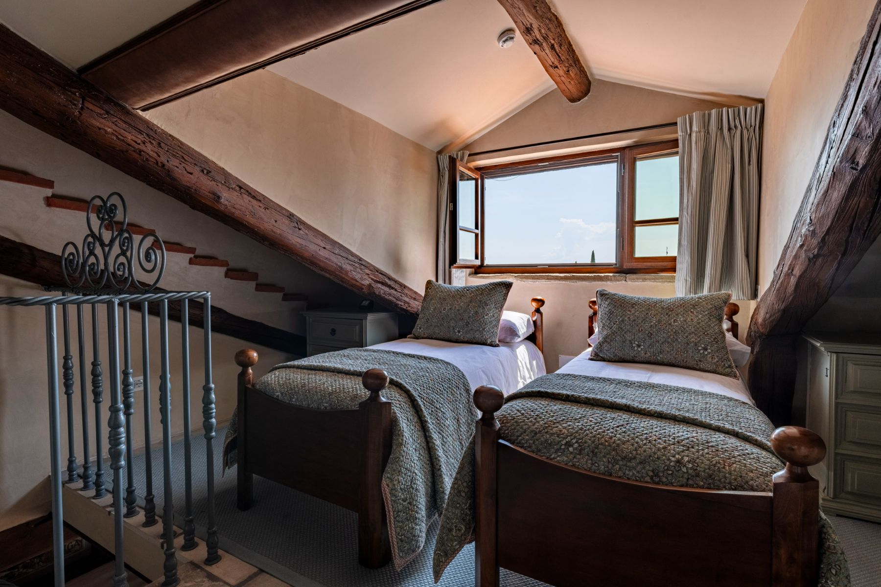 Twin room in the attic with large window at Villa Il Convento in Umbria