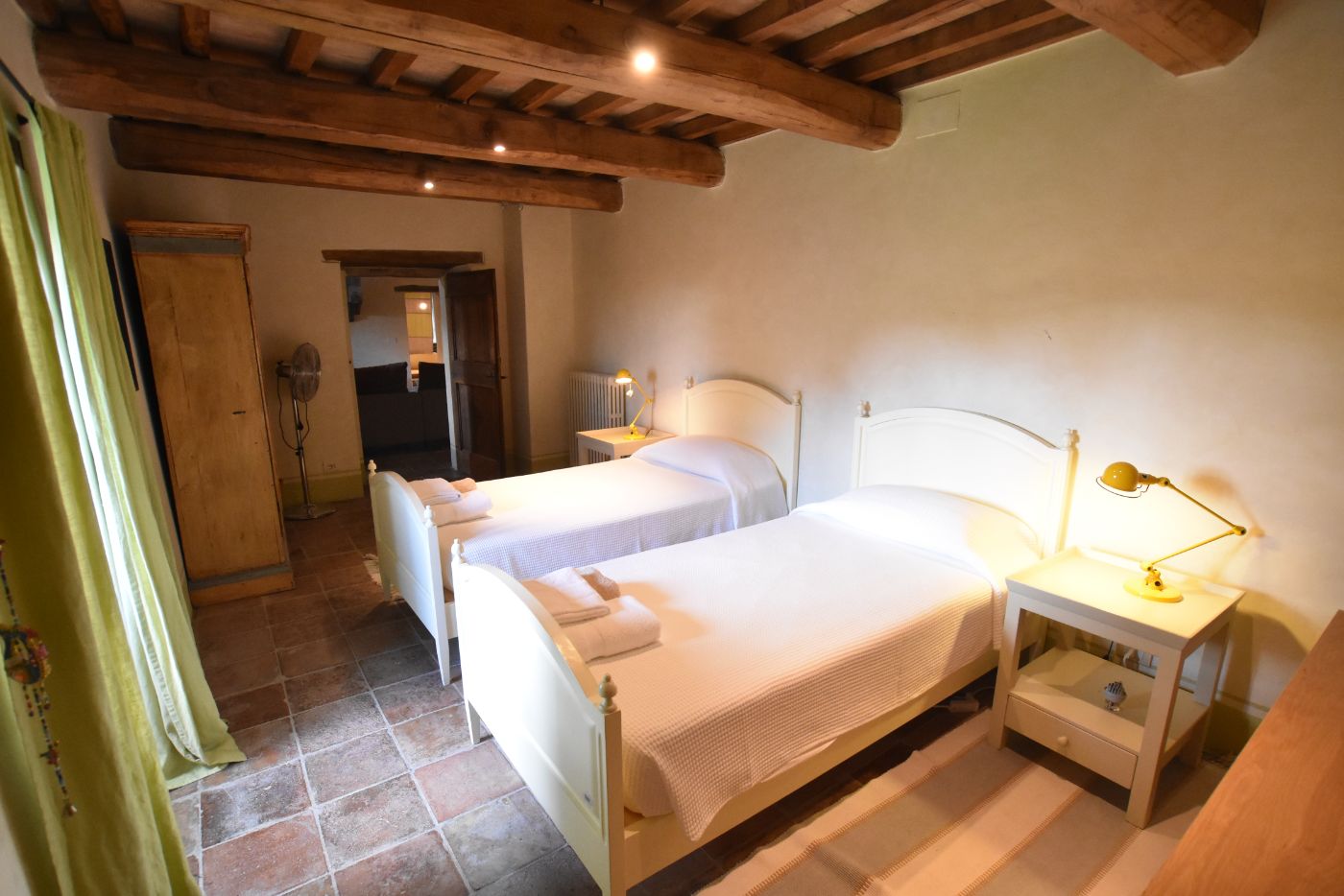 A second twin bedroom at Villa il Falco.