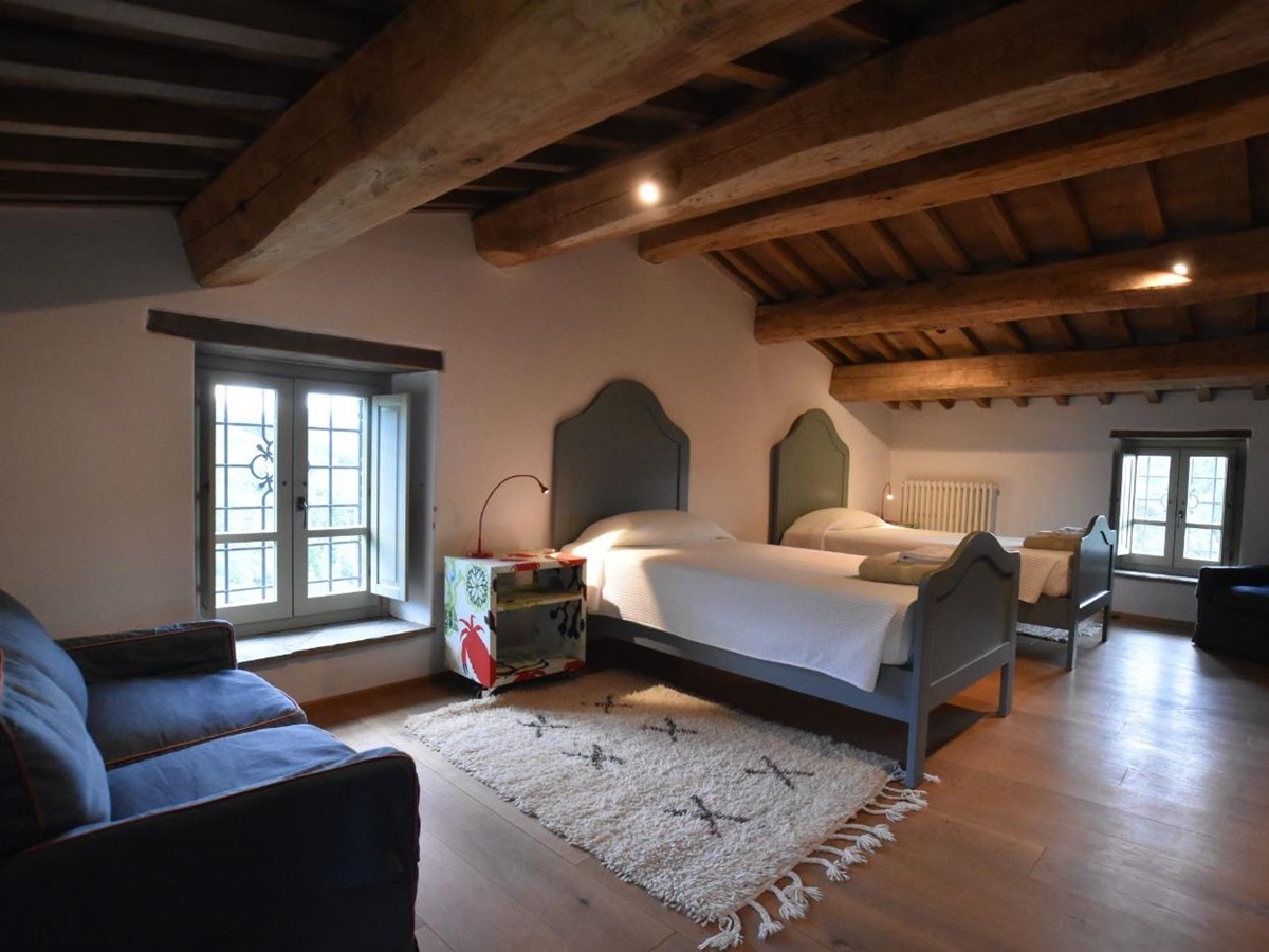 A fourth twin bedroom at Villa il Falco.