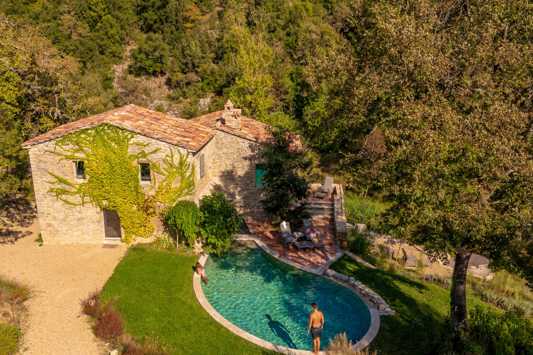 View of villa Il Mulino surrounded by trees featuring the outdoor pool area