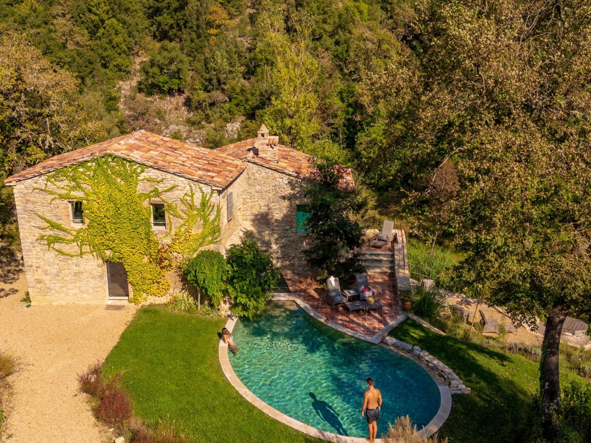 View of villa Il Mulino surrounded by trees featuring the outdoor pool area