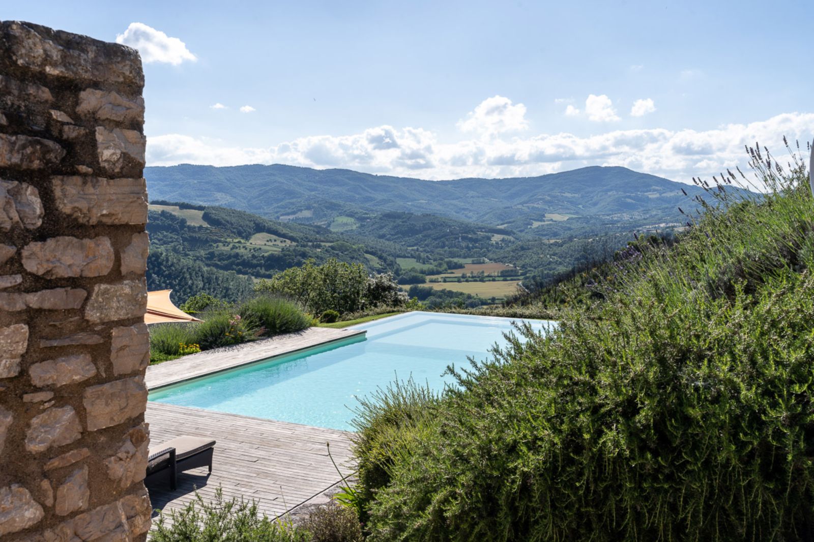 View of pool and countryside at La Cascinale