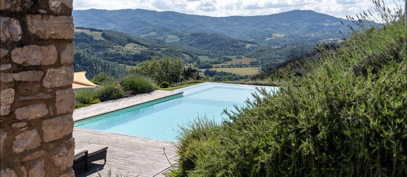 View of pool and countryside at La Cascinale
