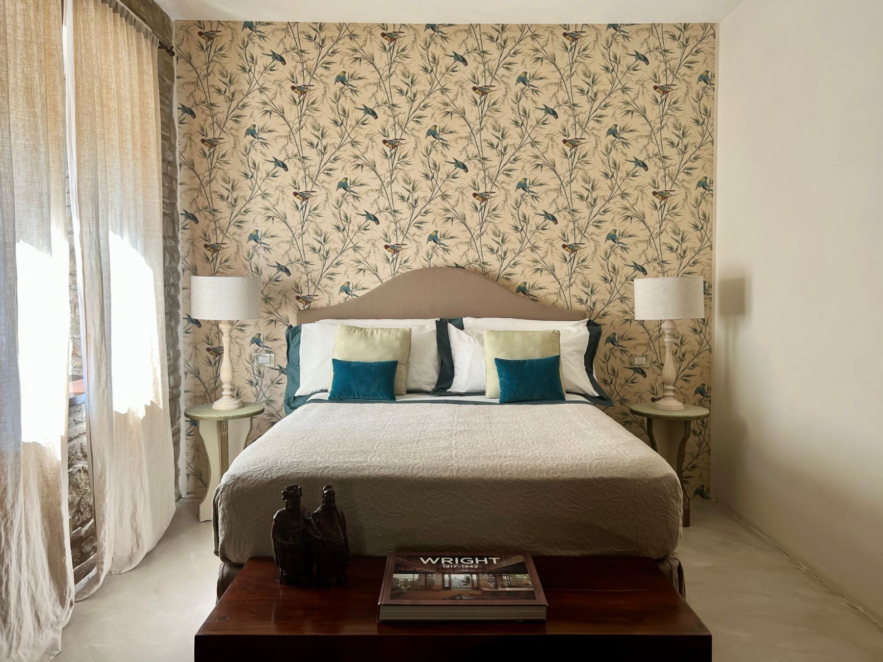 Blue and white double bedroom at L'Eremo in Umbria