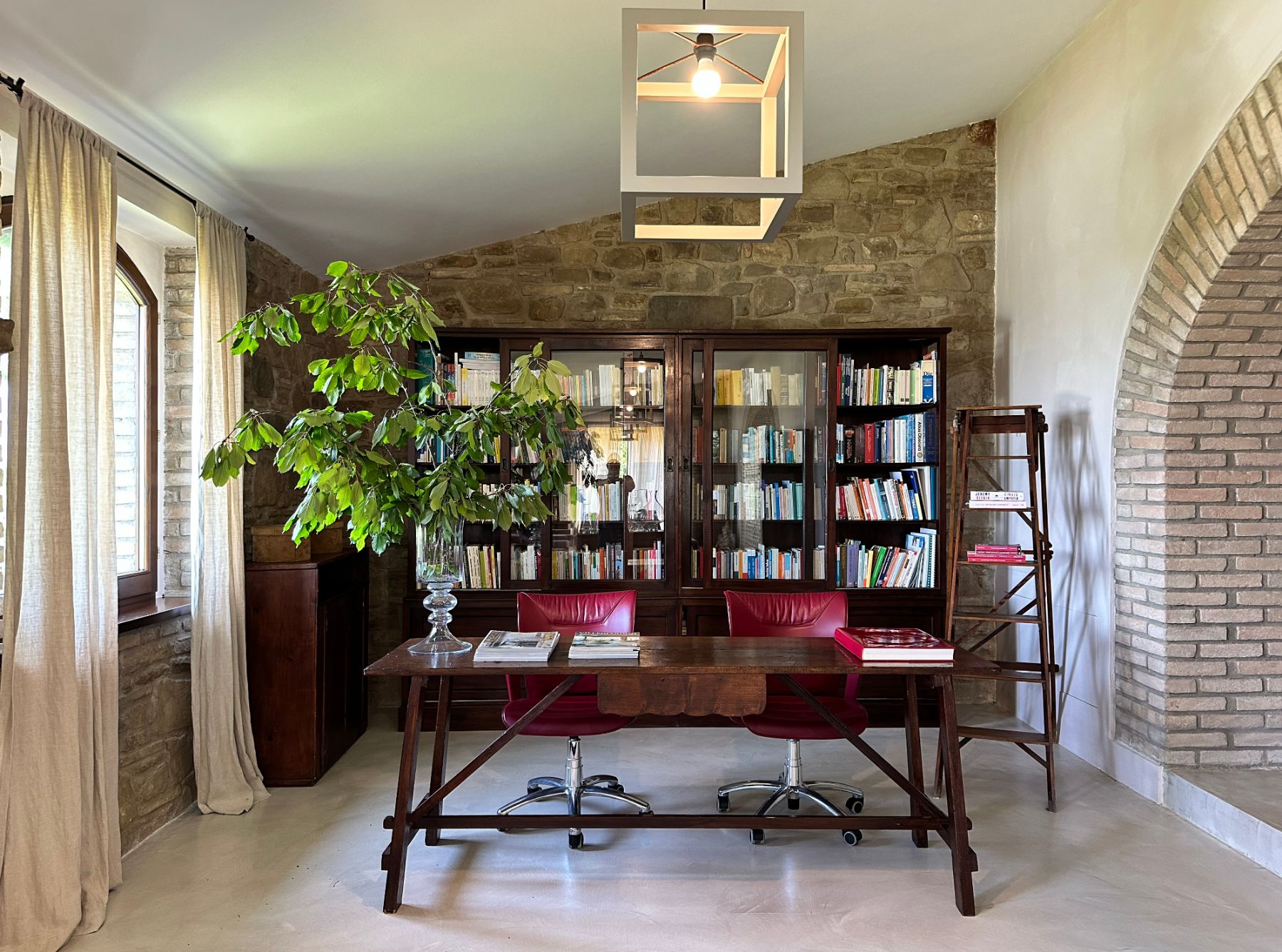 Bookshelf and desk at L'Eremo in Umbria