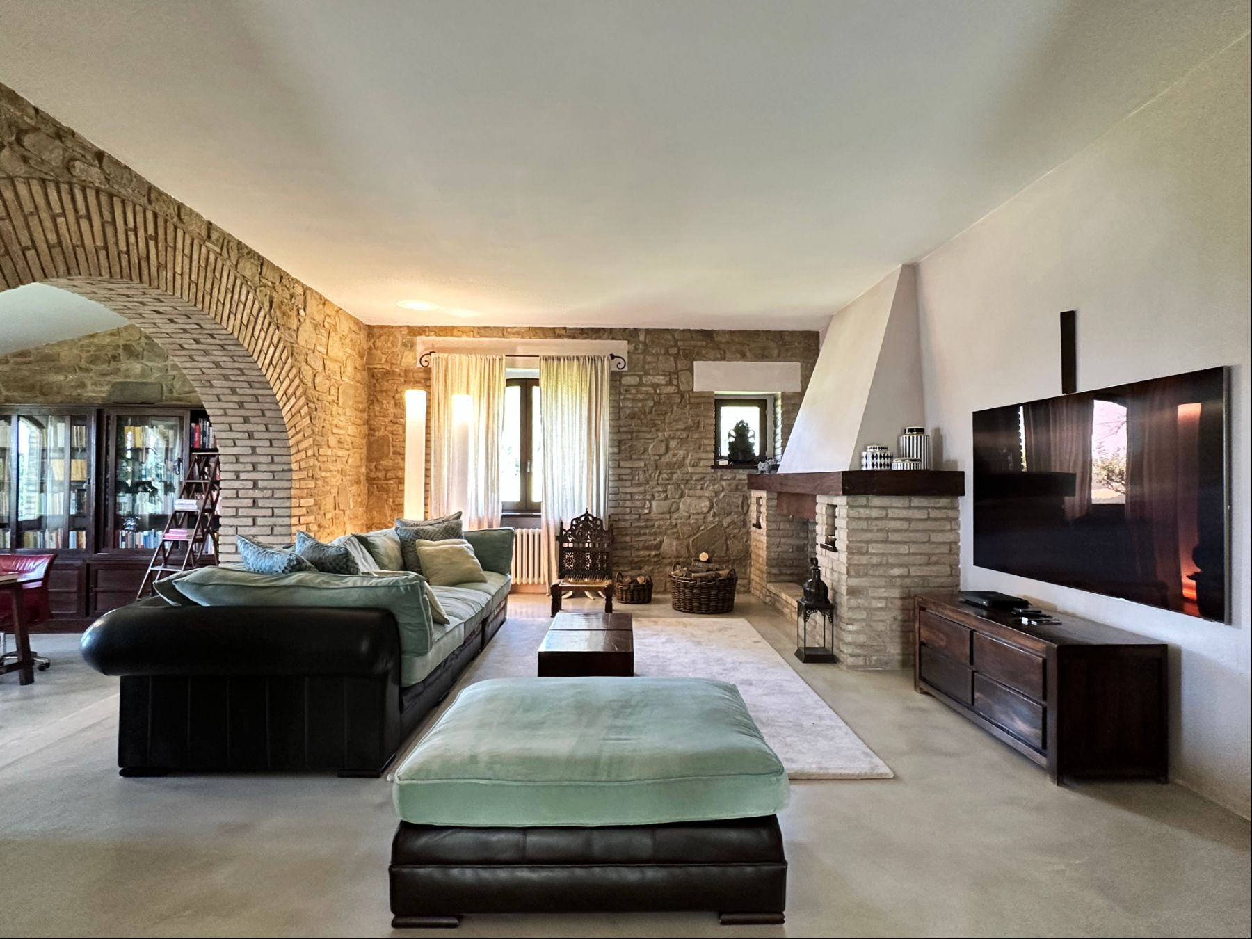 Green sofa lounge at L'Eremo in Umbria