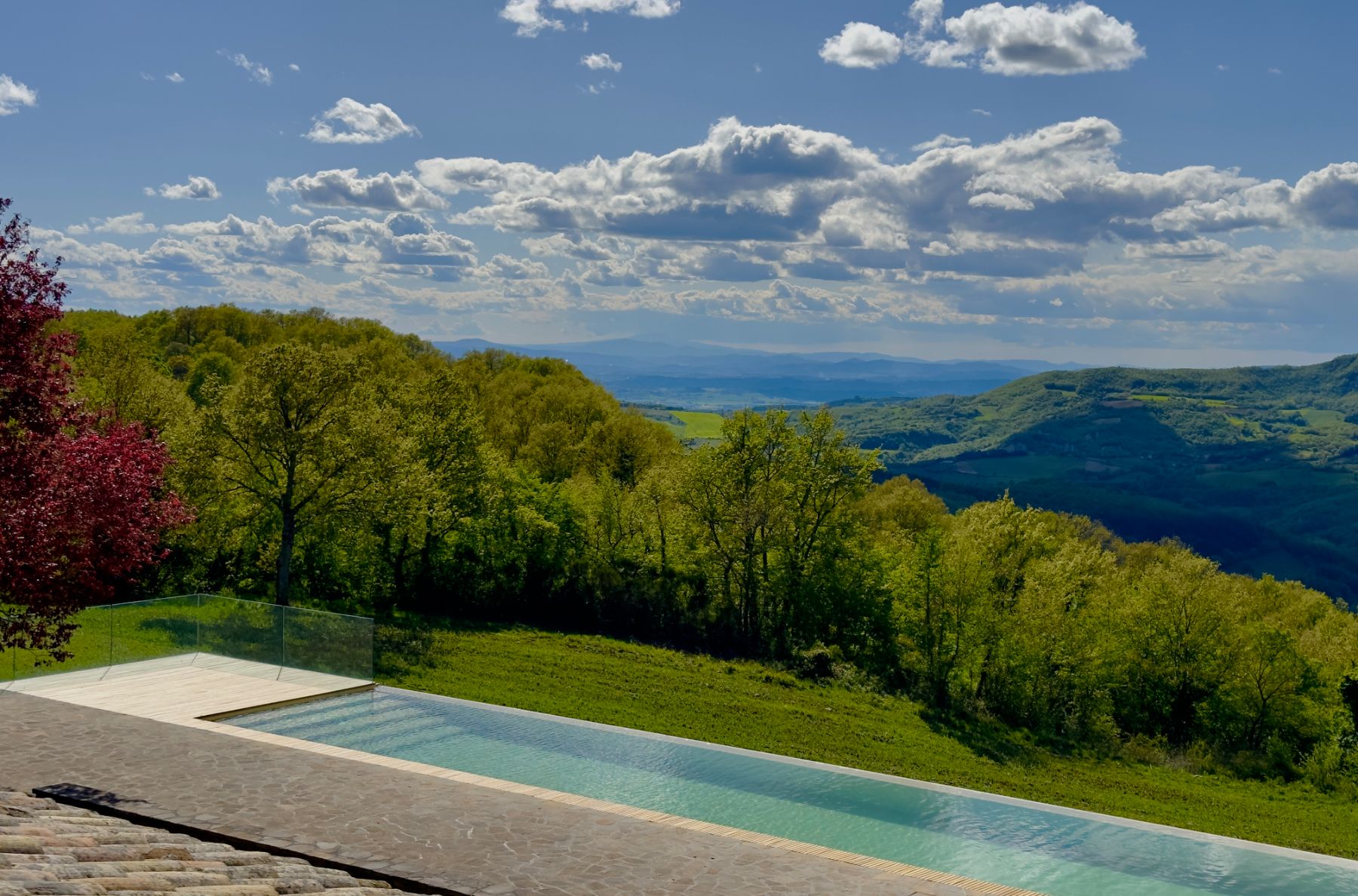 Angled view of pool and landscape at L'Eremo in Umbria