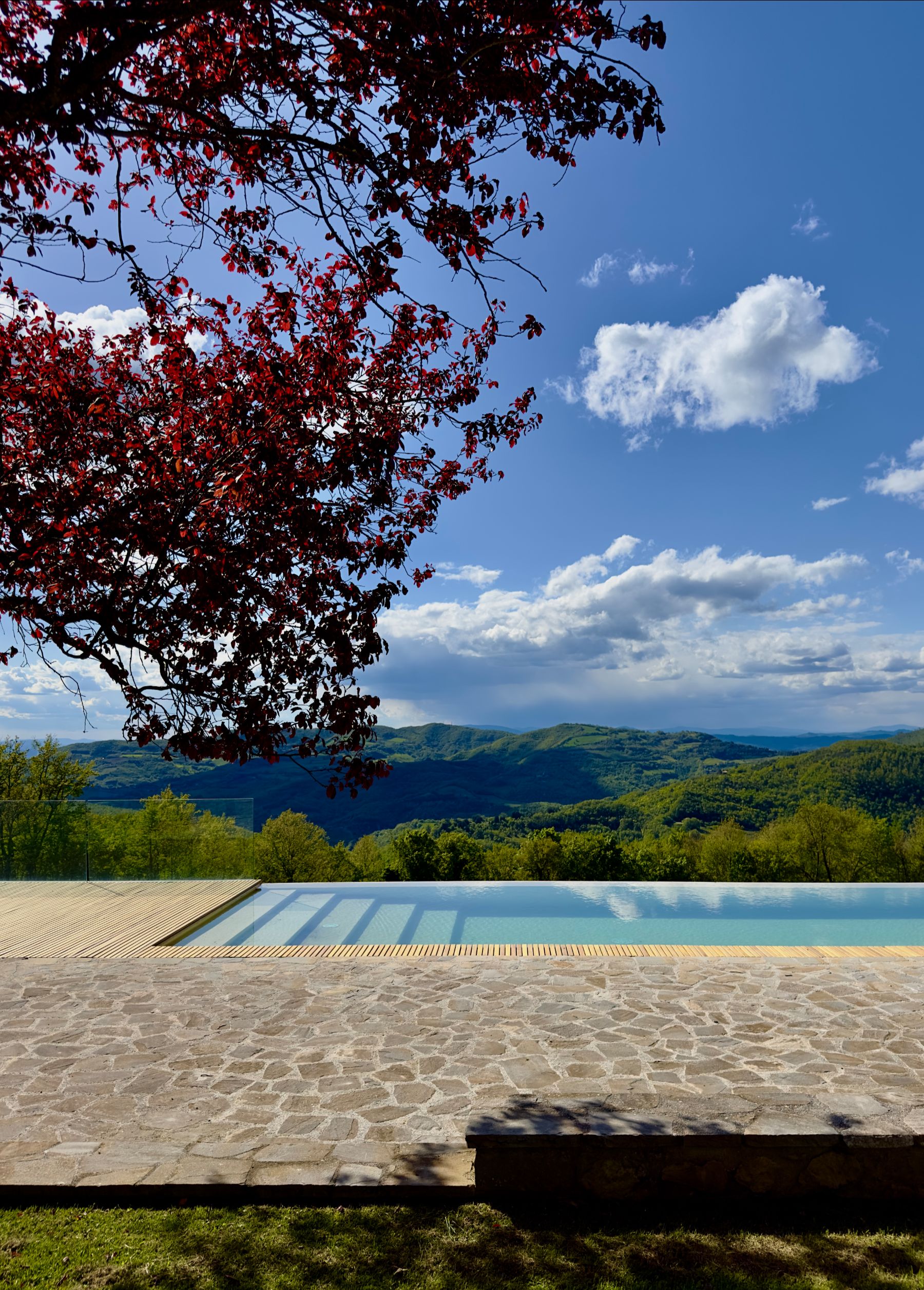 Pool steps and landscape view at L'Eremo in Umbria