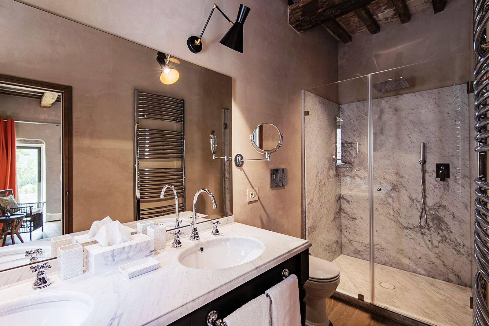 Bathroom with two sinks and big walk in shower at Villa Piuma in Umbria, Italy 