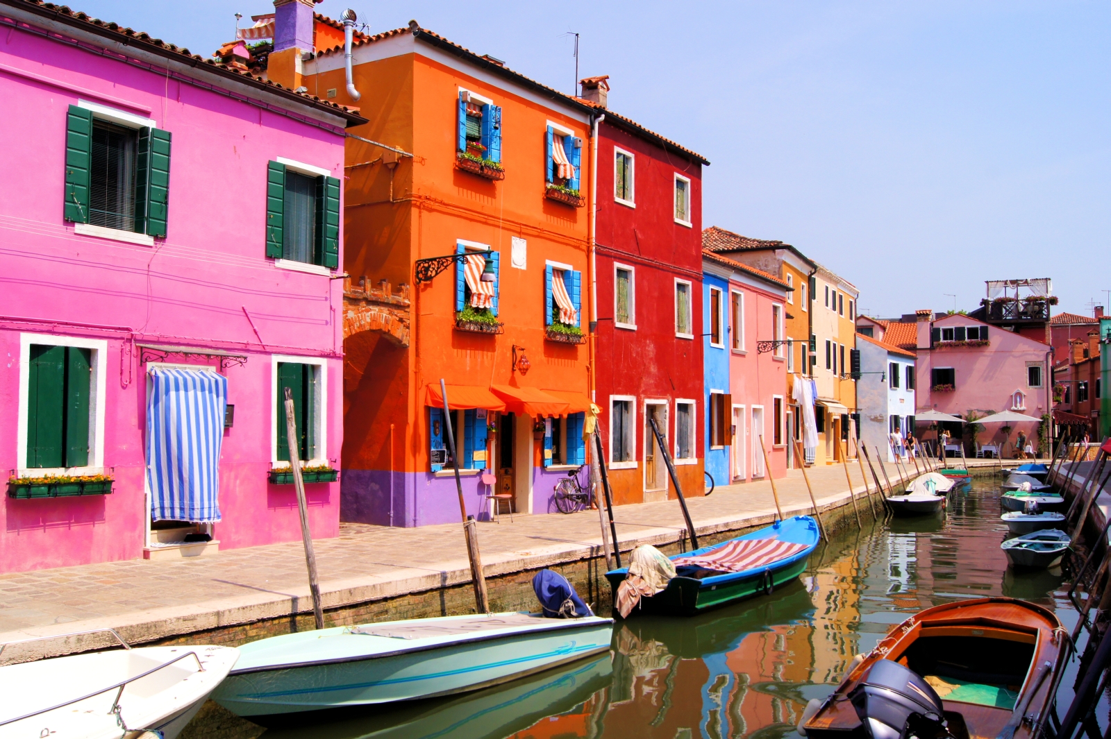 Colourful houses next to canal in Venice