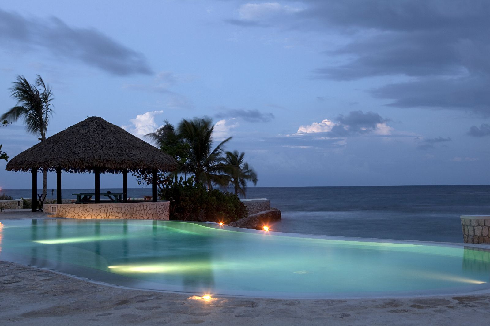 Swimming pool at GoldenEye Jamaica at dusk
