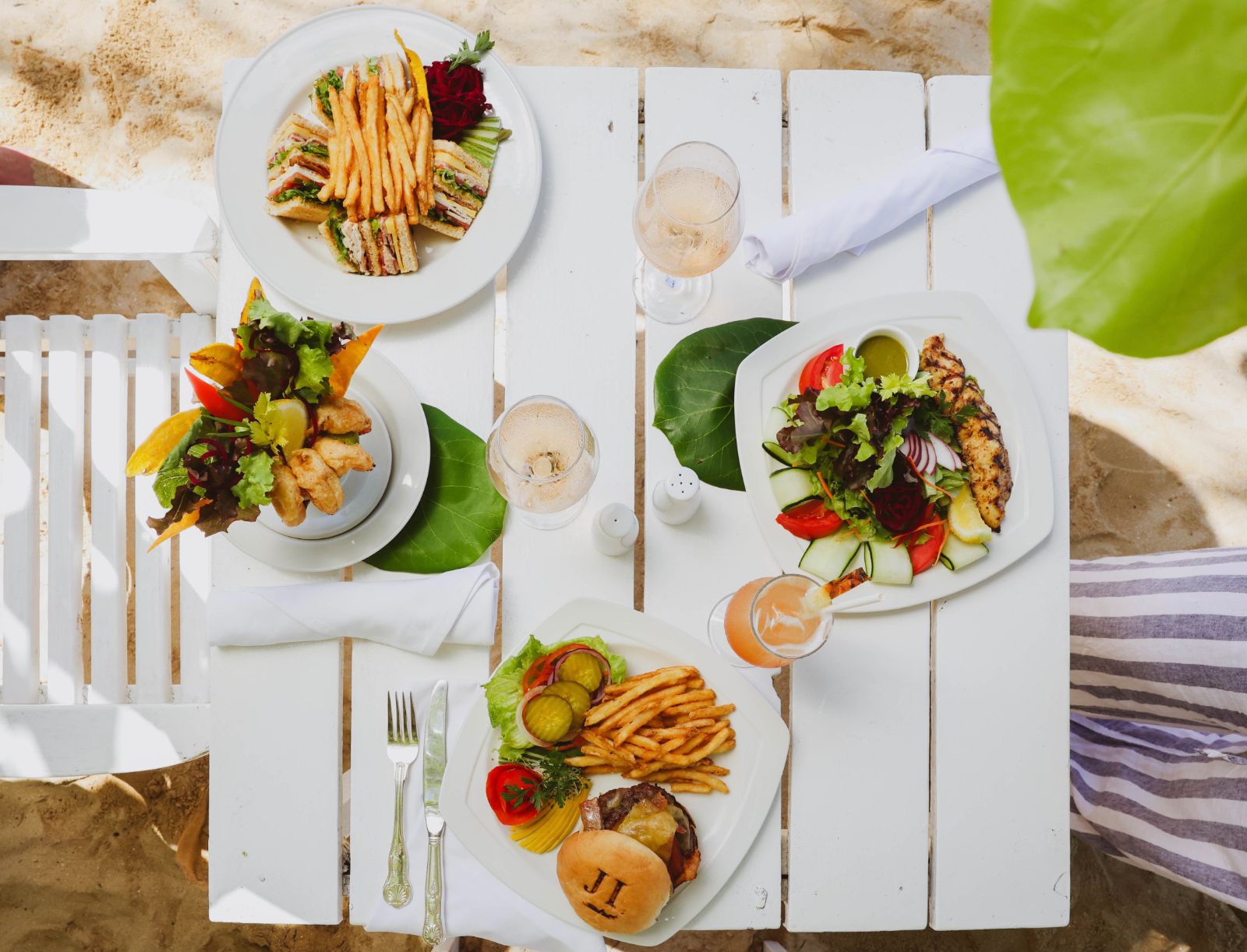Lunch with your toes in the sand at luxury resort Jamaica Inn in Jamaica