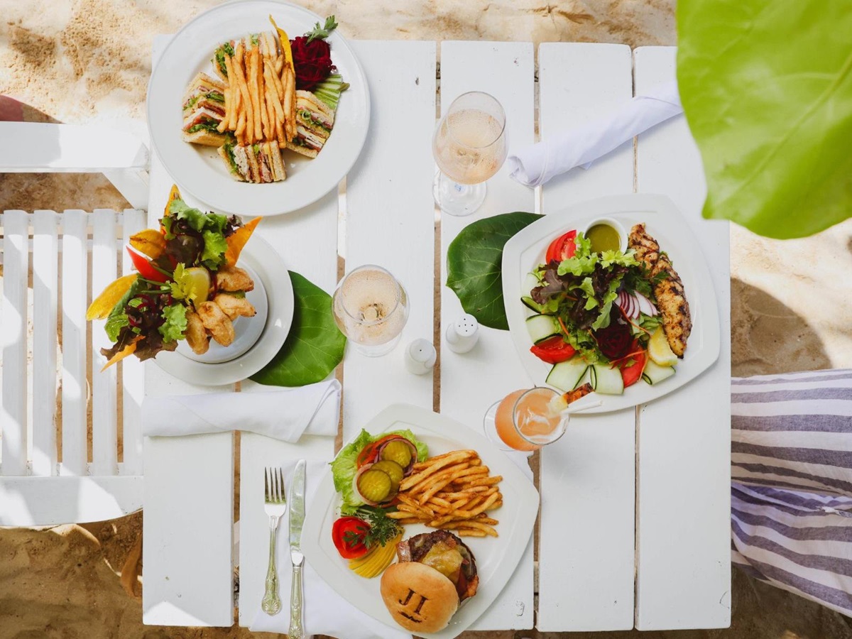 Lunch with your toes in the sand at luxury resort Jamaica Inn in Jamaica