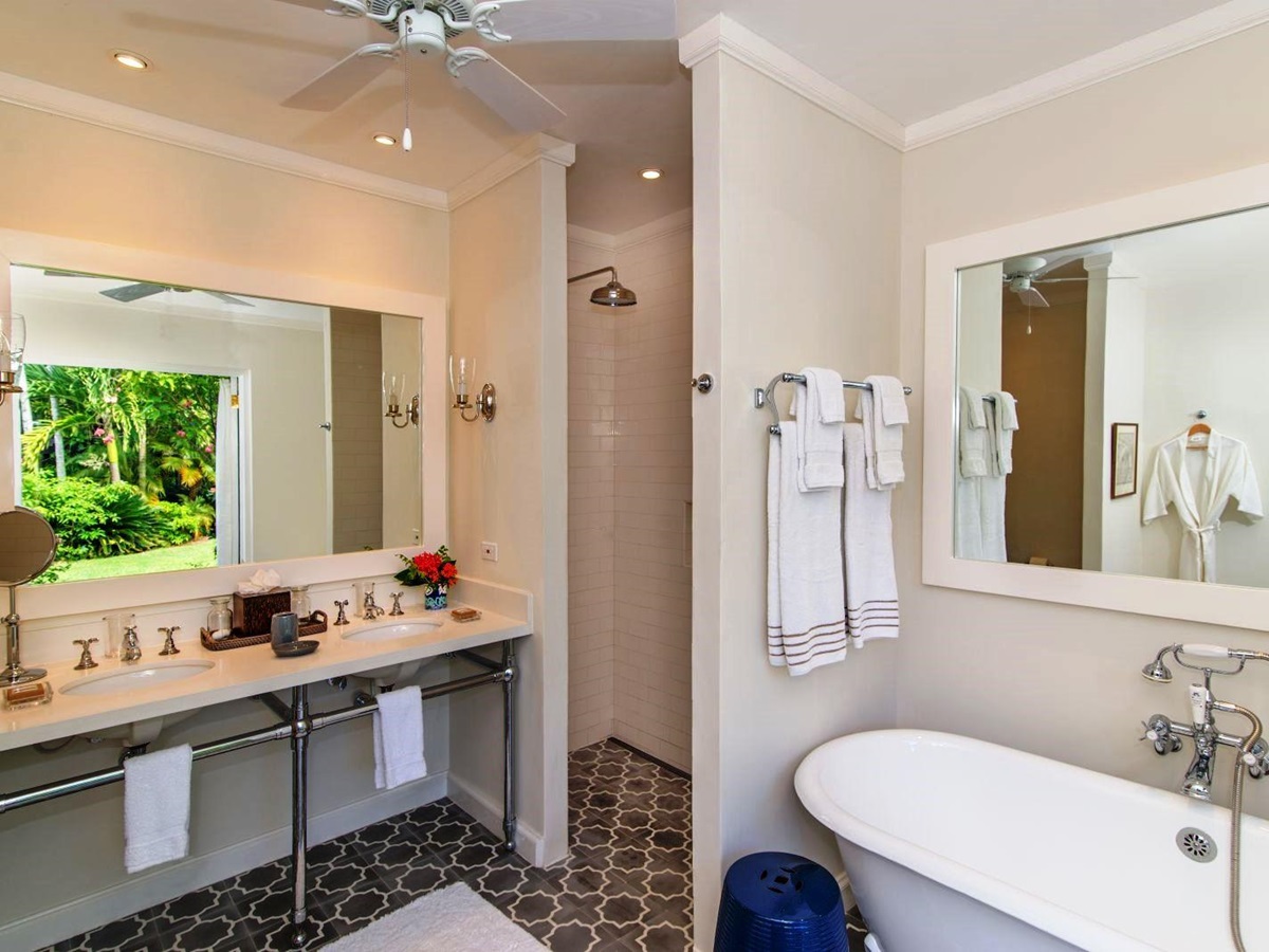 bathroom with two sinks and bathtub at Almond Hill Villa, Montego Bay Jamaica