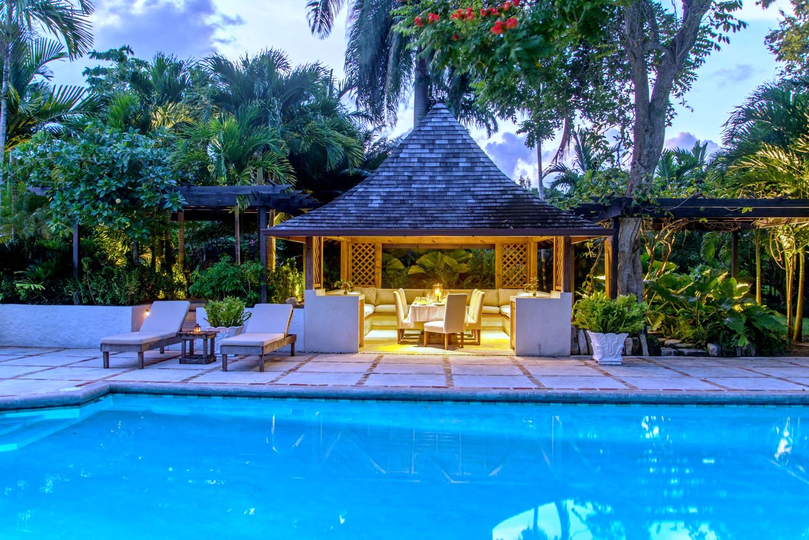 pool with gazebo behind lit up at night at Almond Hill Villa, Montego Bay Jamaica
