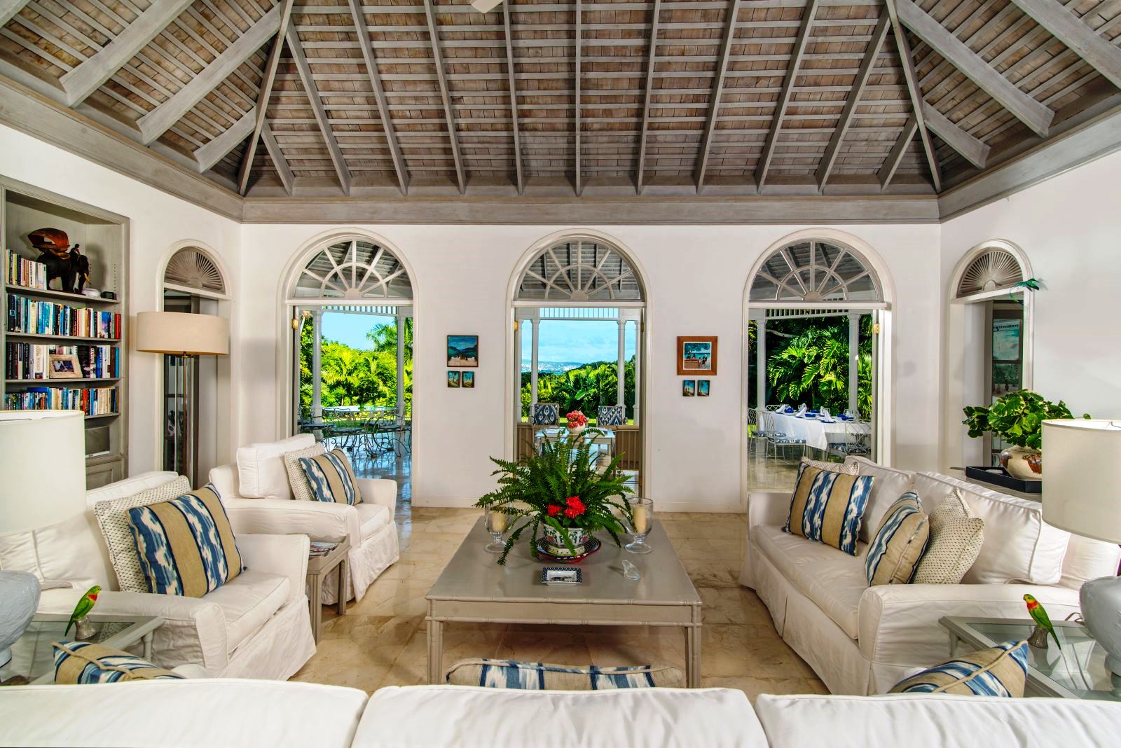 seating area with white sofas and coffee table at Almond Hill Villa, Montego Bay Jamaica