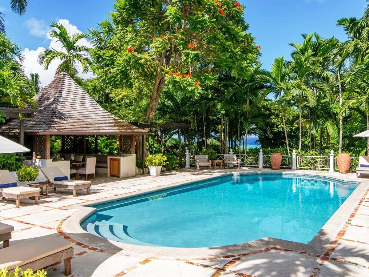 swimming poll with gazebo and pool furniture at Almond Hill Villa, Montego Bay Jamaica