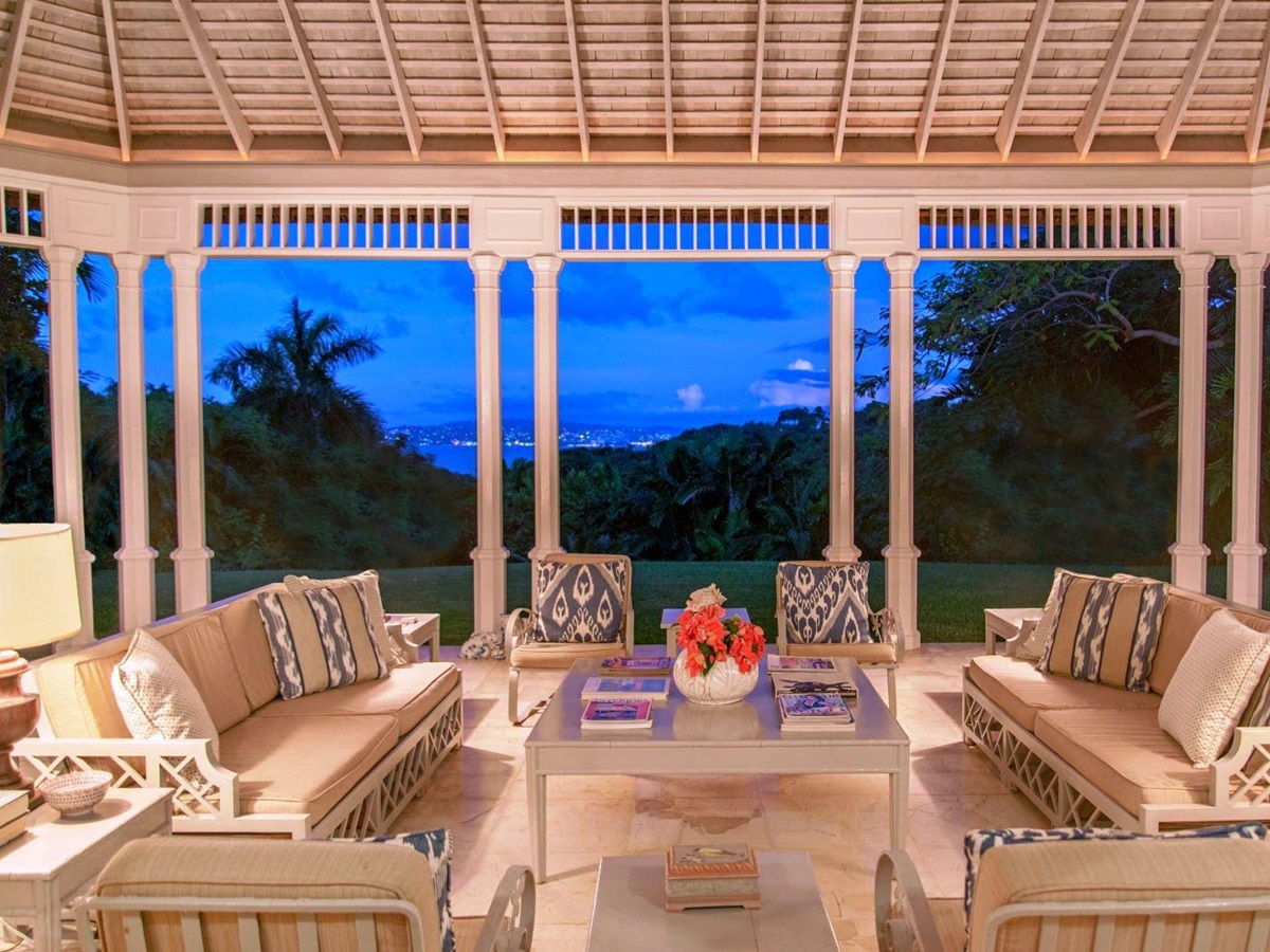 sitting area with comfy furniture on marble floor and views over Montega Bay, Jamaica