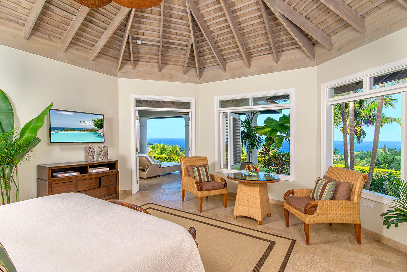 Bedroom and sitting area at Harmony Hill in Jamaica