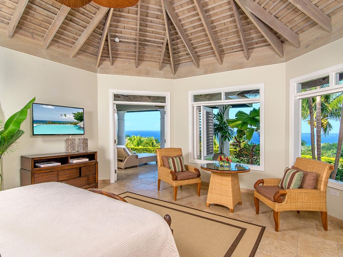 Bedroom and sitting area at Harmony Hill in Jamaica