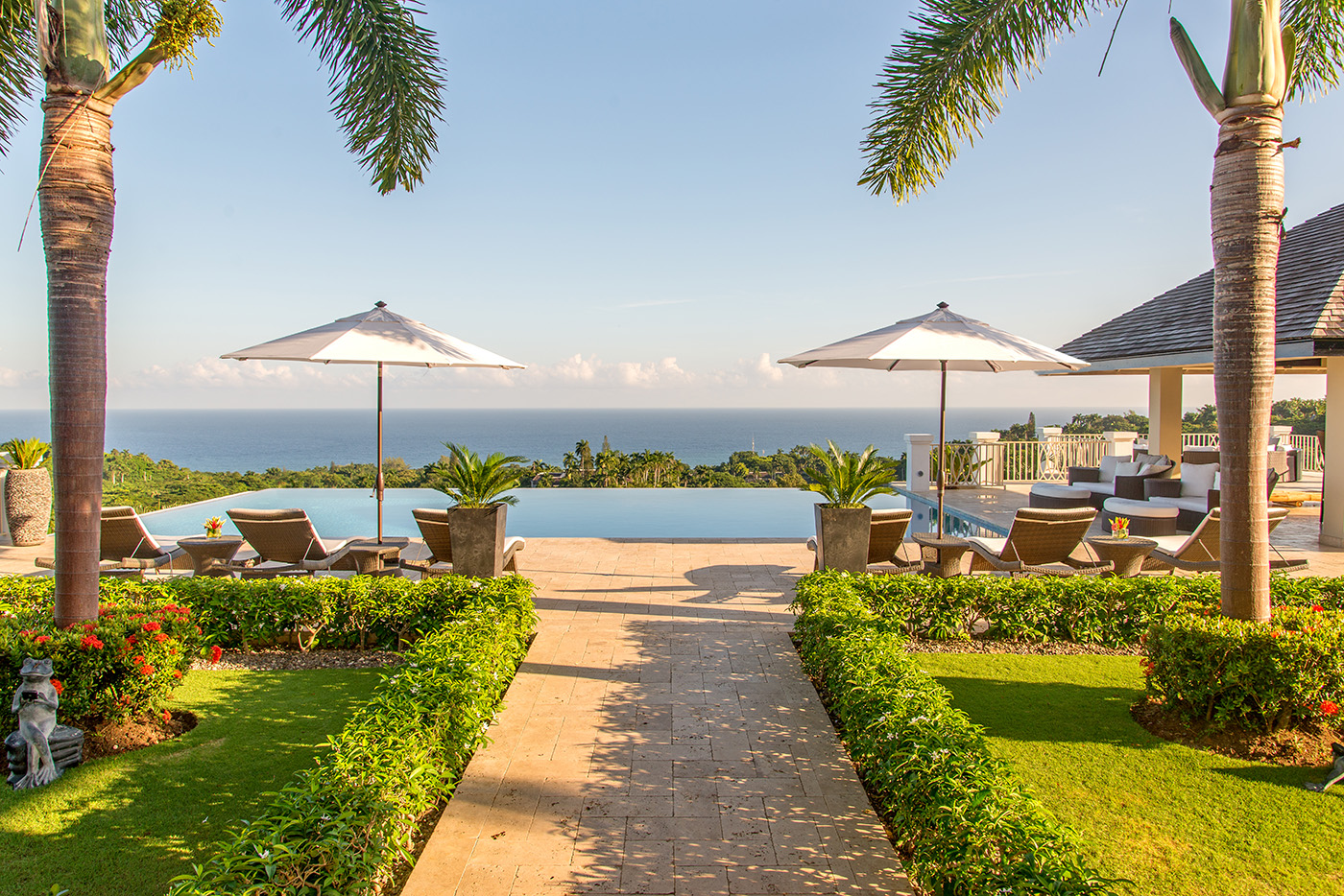 The gardens and pool in the distance at Harmony Hill in Jamaica