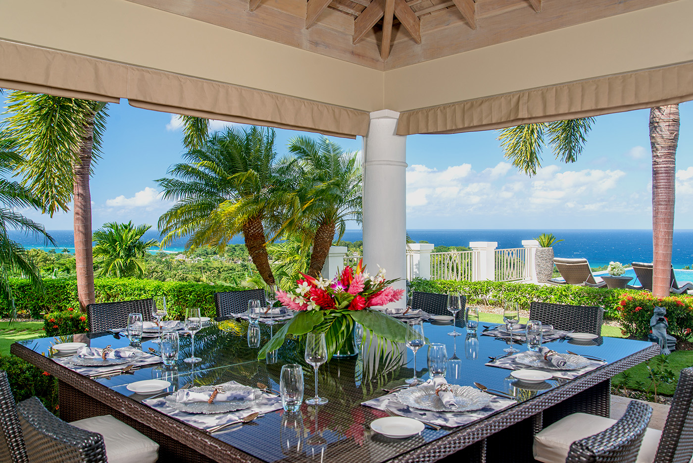 Outdoor dining with sea views at Harmony Hill in Jamaica