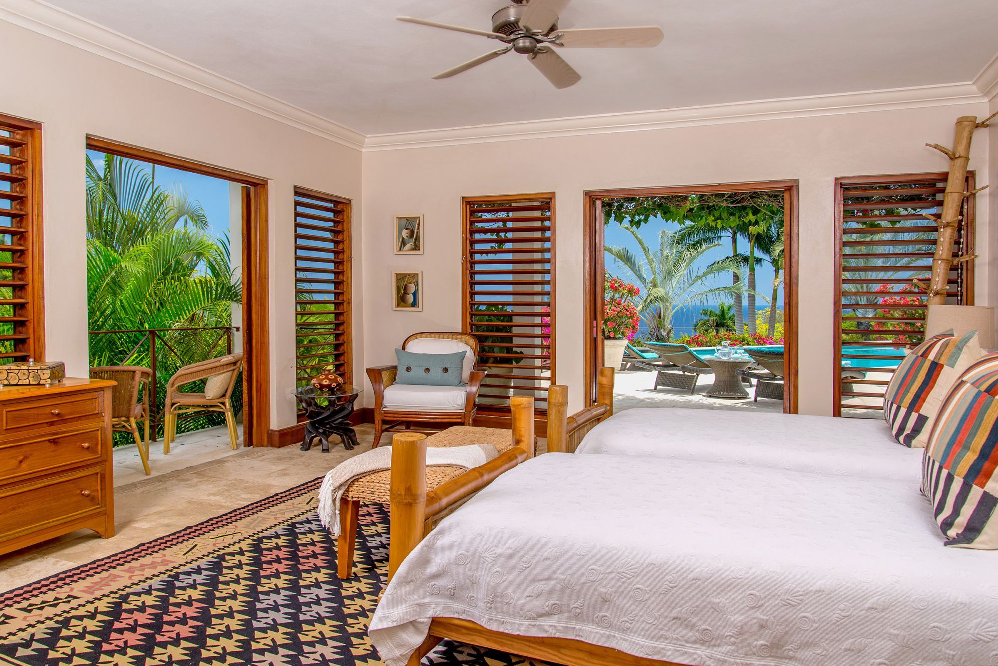 Twin bedroom with beach access at Infinity, Jamaica