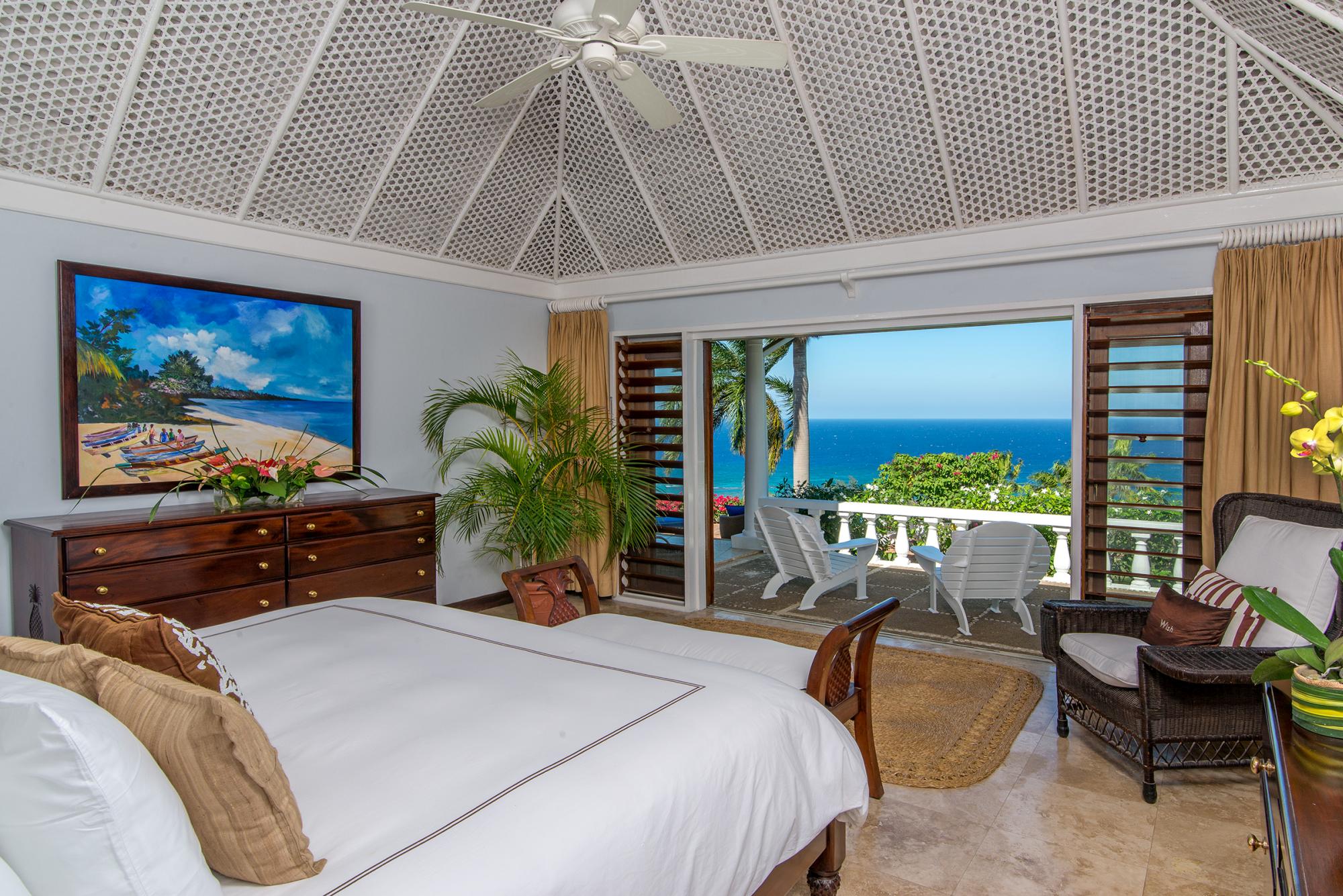 Double bedroom with terrace access in Villa Casuarina, Jamaica