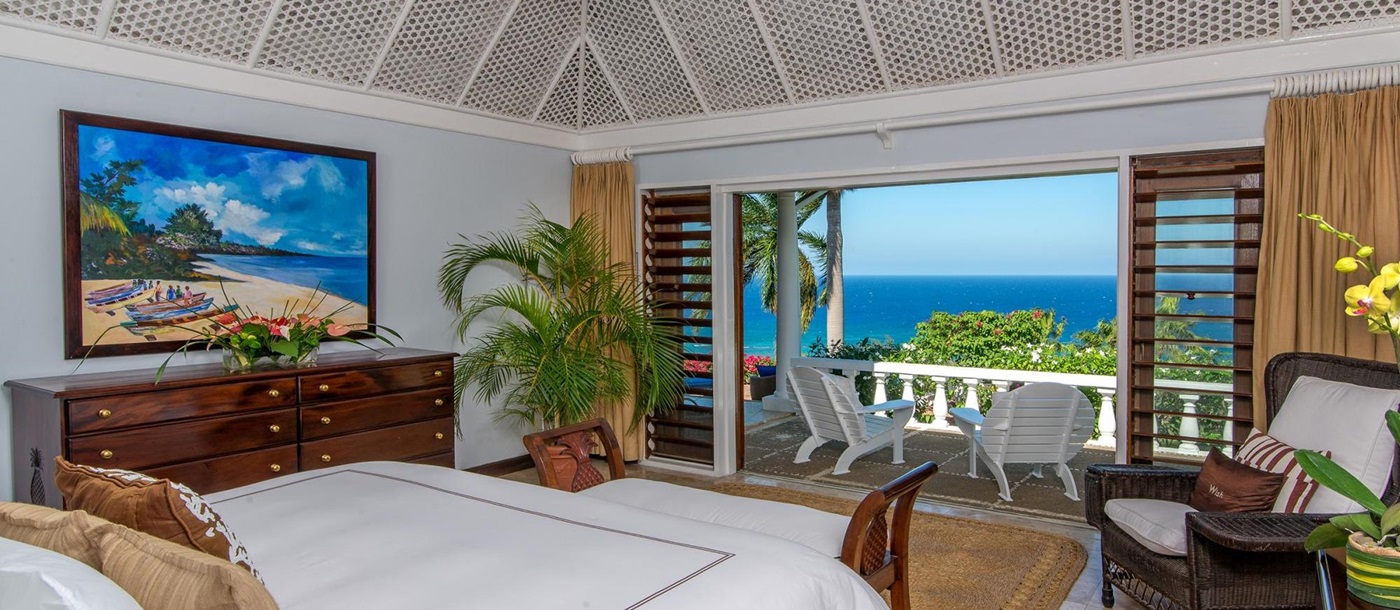 Double bedroom with terrace access in Villa Casuarina, Jamaica