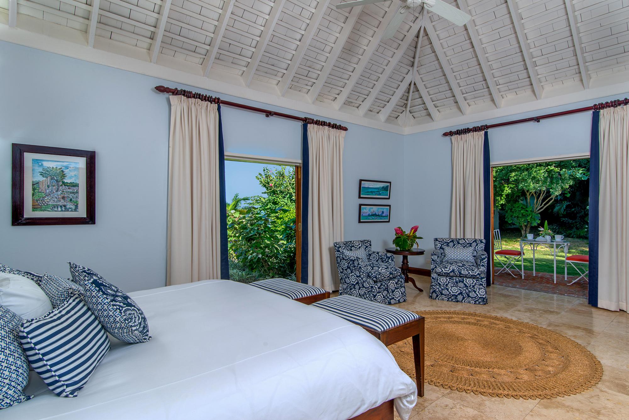 double bedroom with garden access in Villa Casuarina, Jamaica