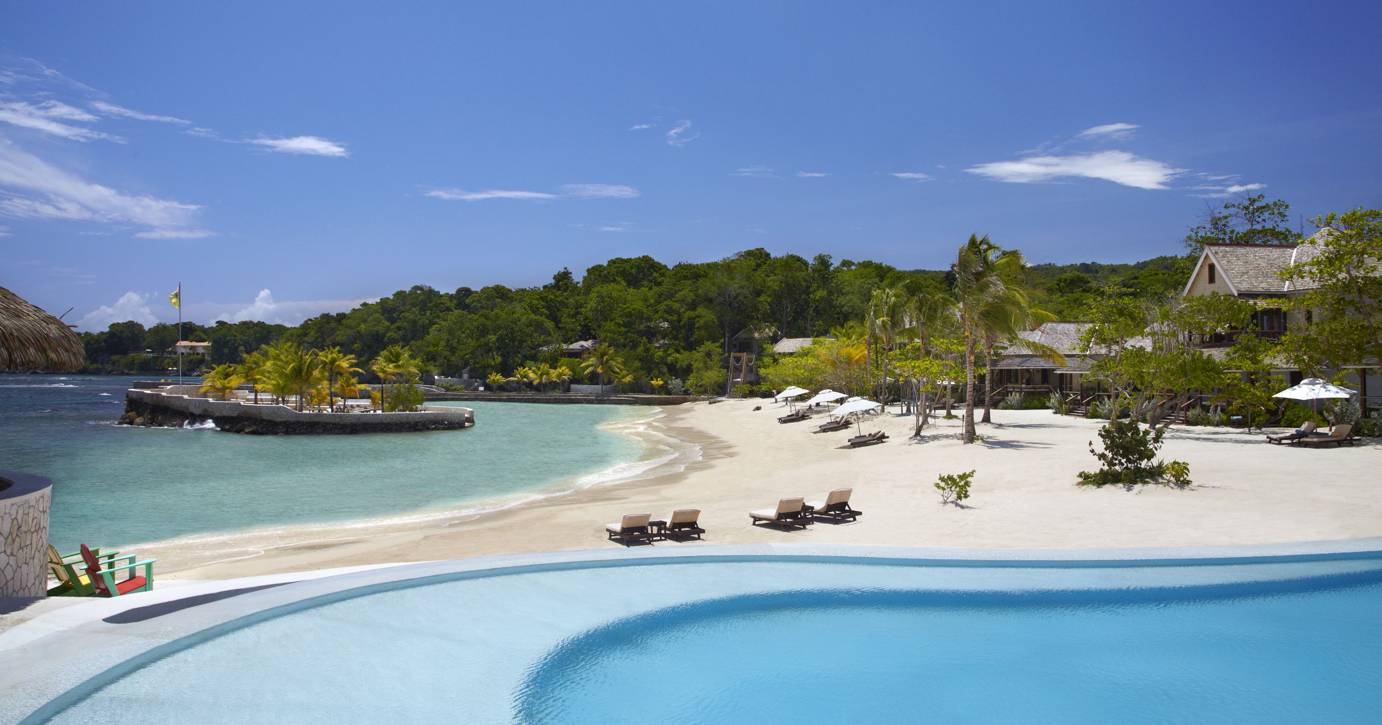 swimming pool and beach at goldeneye in jamaica