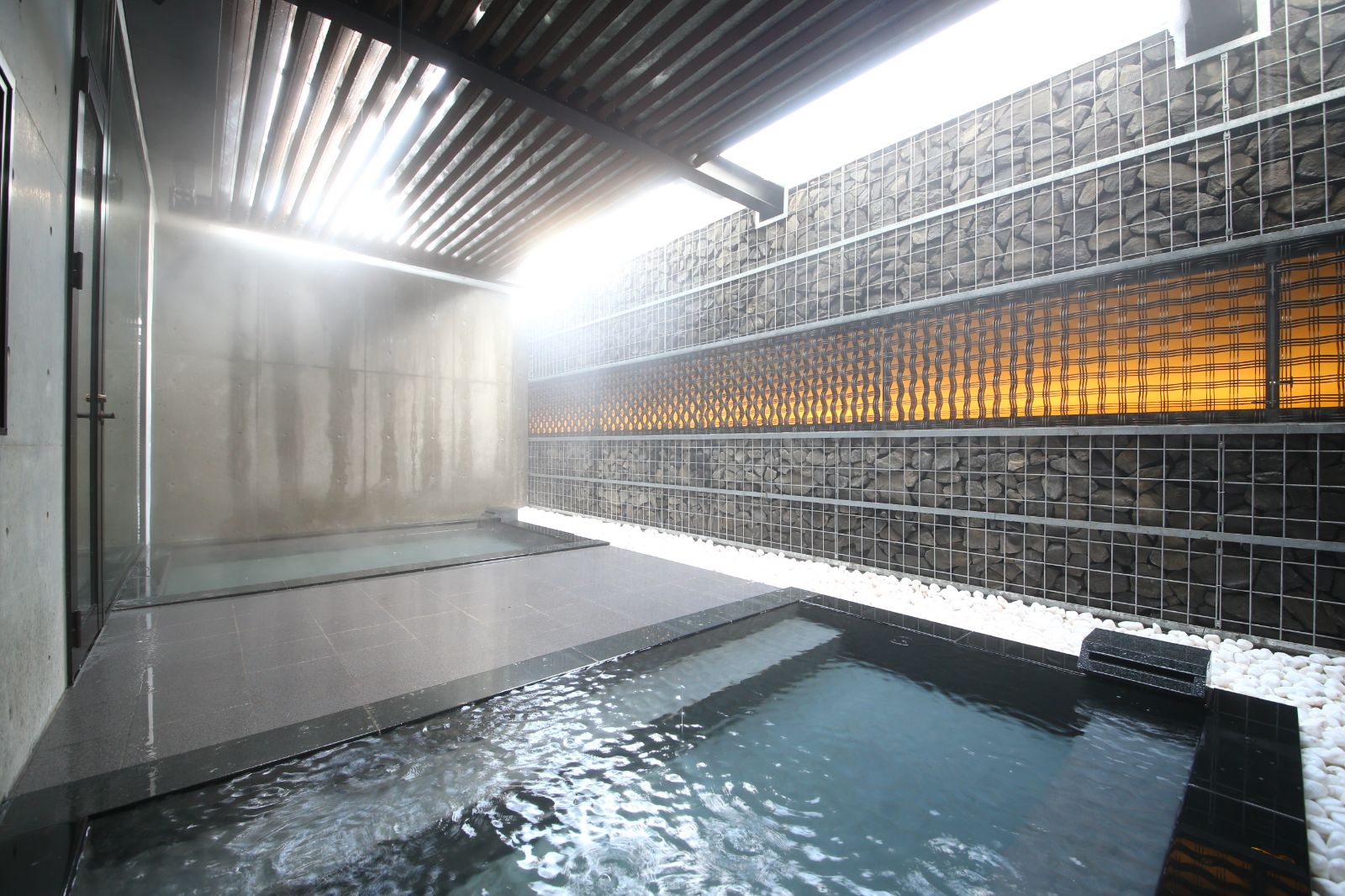 A traditional onsen in the spa at AYA Niseko ski hotel in Japan