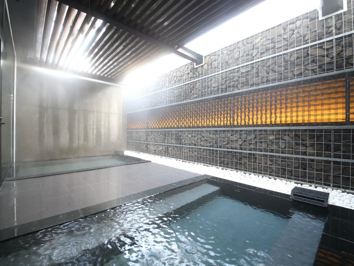 A traditional onsen in the spa at AYA Niseko ski hotel in Japan