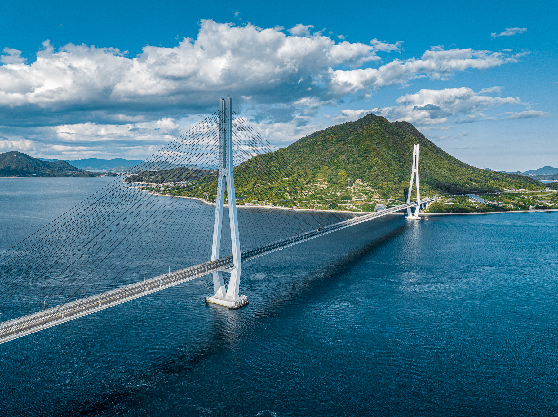 Cycling tour across a bridge in the Seto Inland Sea from Azumi Setoda
