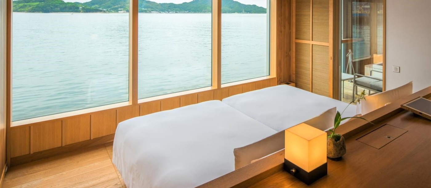 Guest cabin bedroom onboard guntû in Japan's Seto Inland Sea