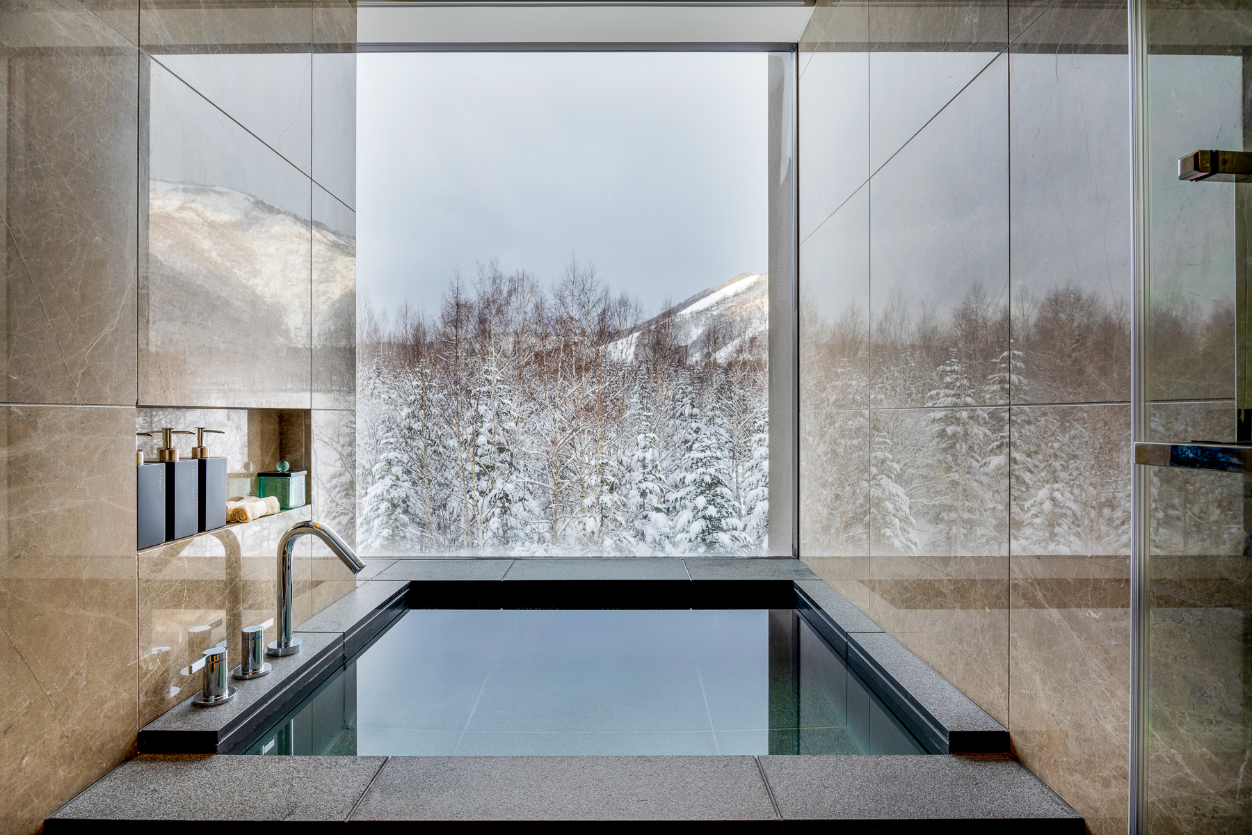 A soaking tub at Higashiyama Niseko Village, A Ritz Carlton Reserve in Japan