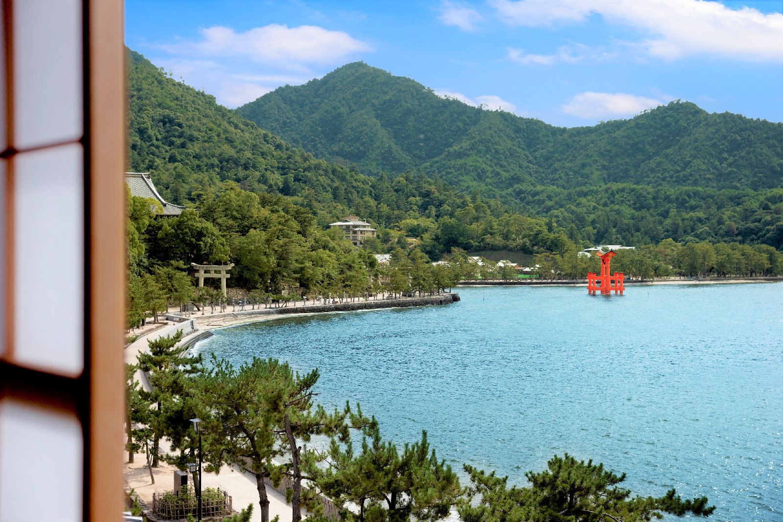 View of bay and torii gate at Kurayado Iroha Ryokan on Miyajima Island Japan