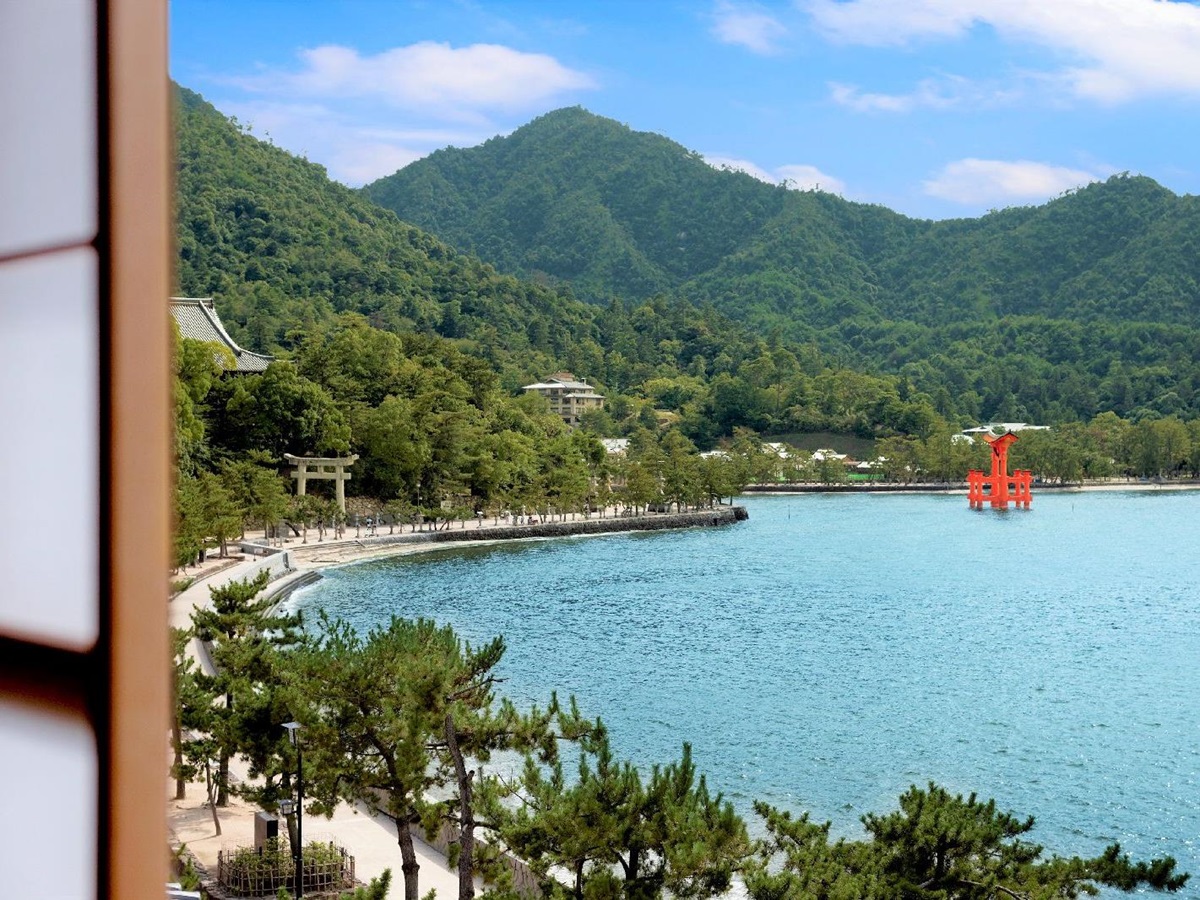 View of bay and torii gate at Kurayado Iroha Ryokan on Miyajima Island Japan