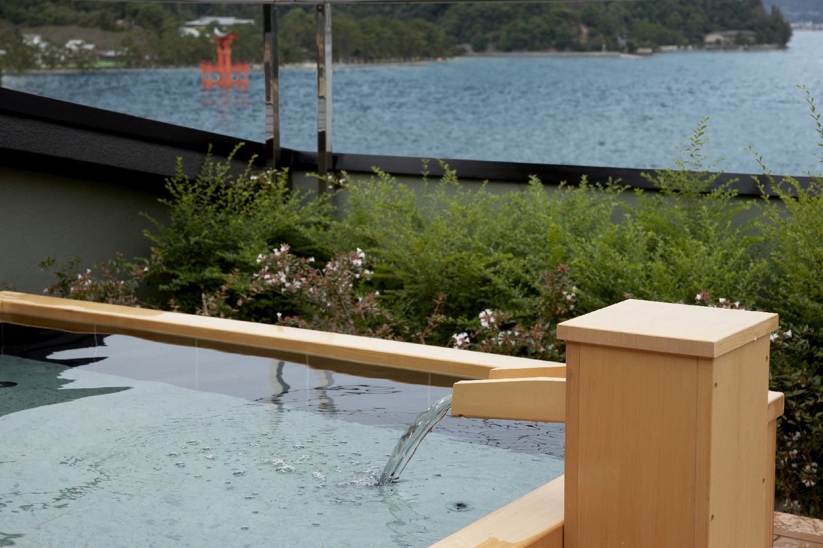 Rooftop tub at Kurayado Iroha Ryokan on Miyajima Island Japan