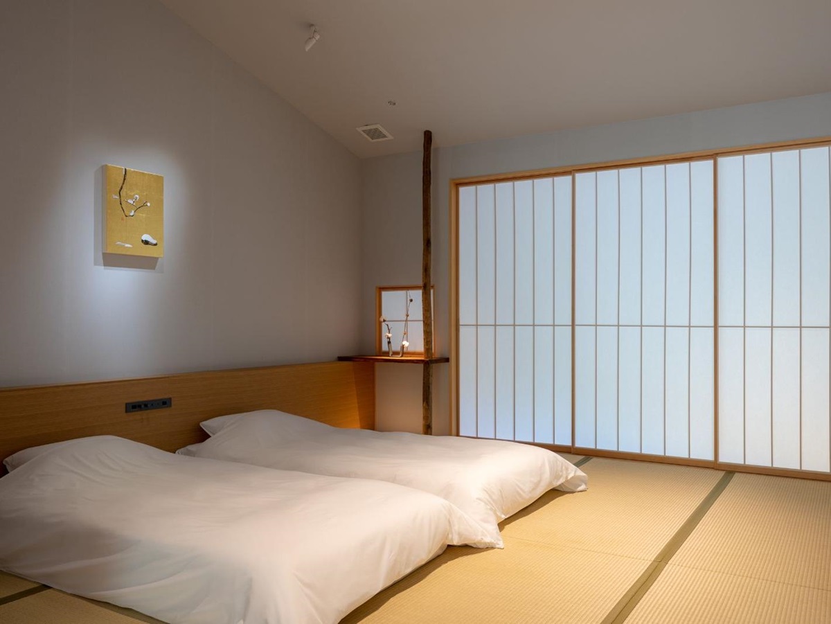 Guest suite bedroom at Naoshima Ryokan Roka in Japan