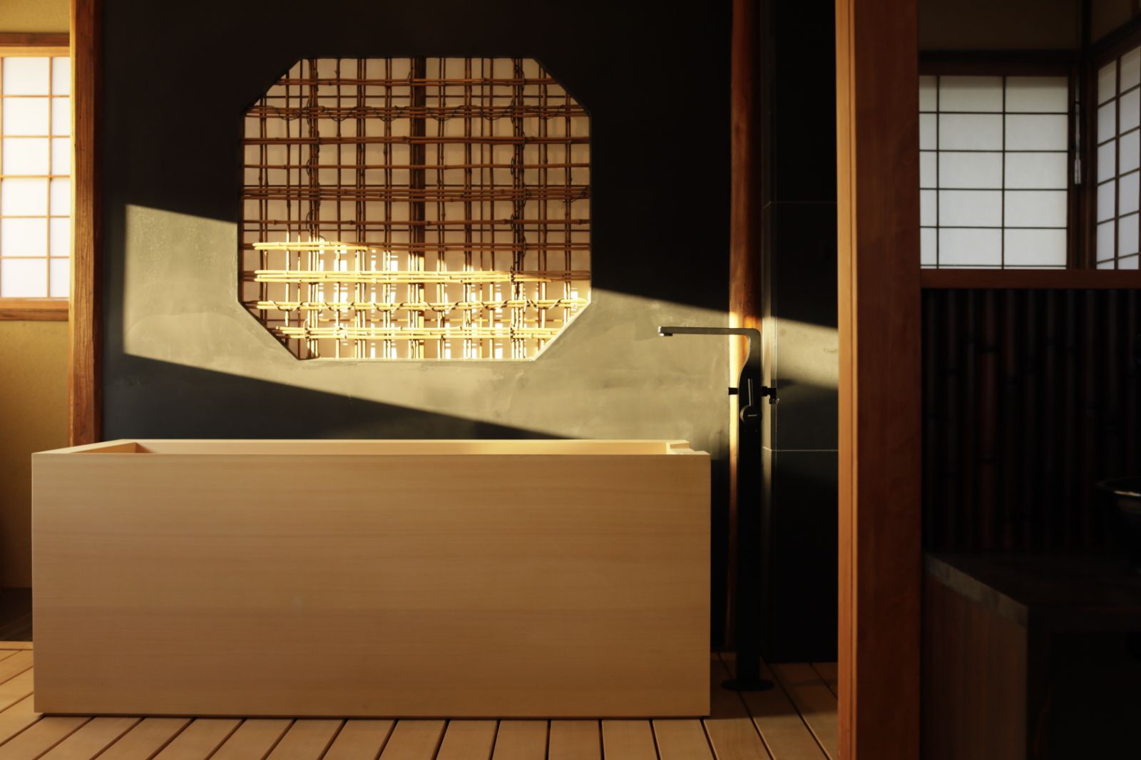 Bathtub and bathroom at Sowaka ryokan in Kyoto, Japan